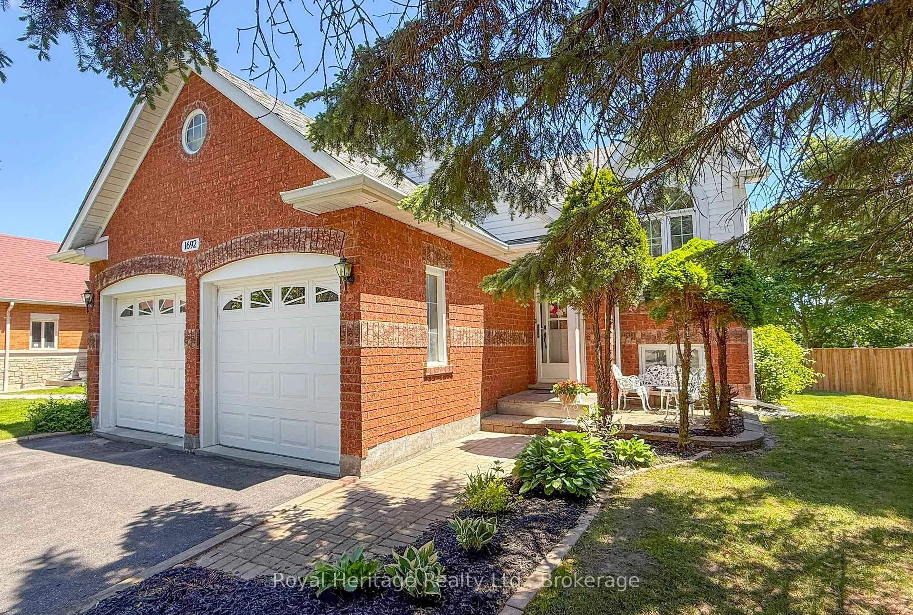 Home with brick exterior material, street for 1692 Edenwood Dr, Oshawa Ontario L1G 7Y5