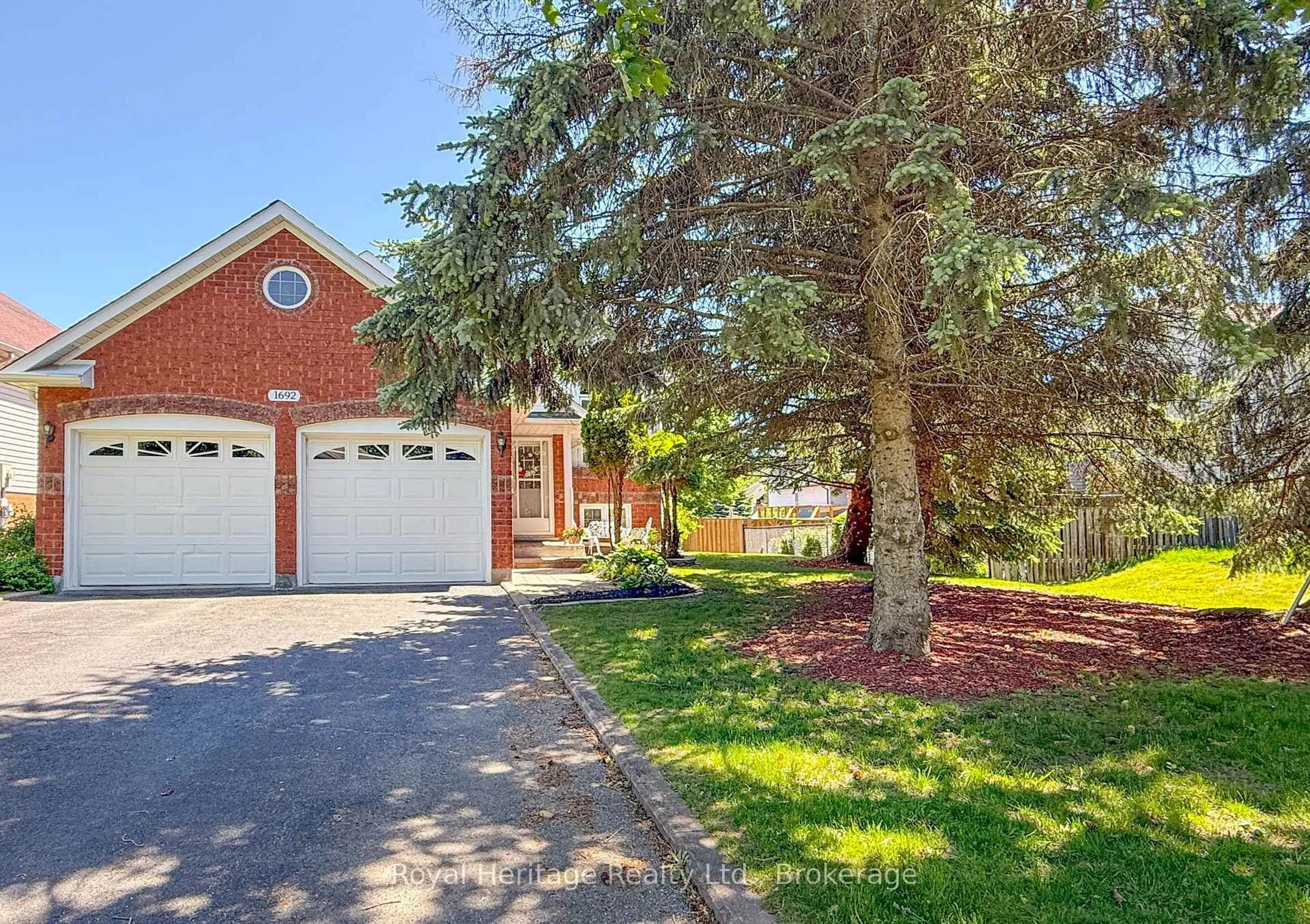 Home with brick exterior material, street for 1692 Edenwood Dr, Oshawa Ontario L1G 7Y5