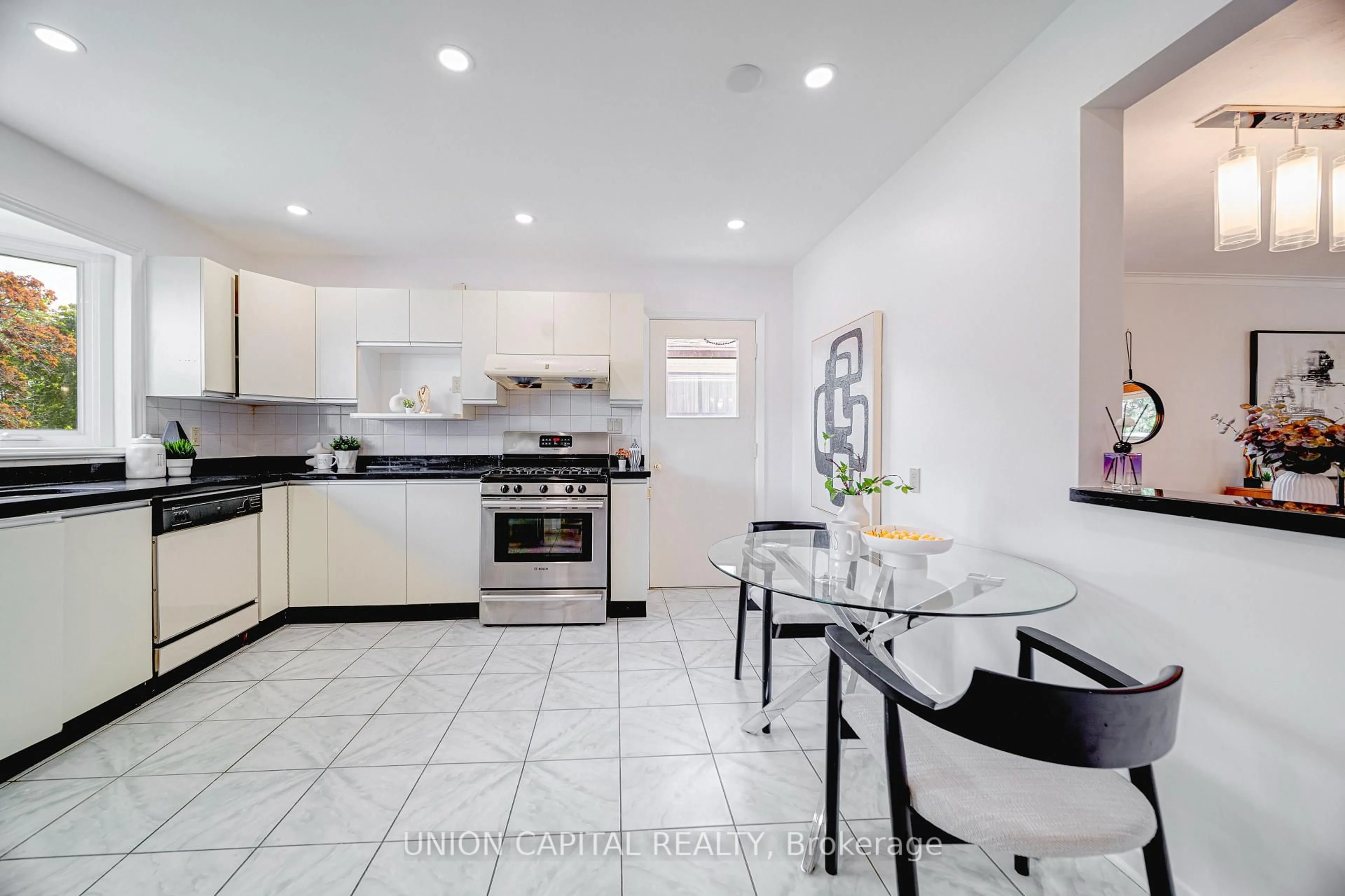 Open concept kitchen, ceramic/tile floor for 483 Huntingwood Dr, Toronto Ontario M1W 1G5