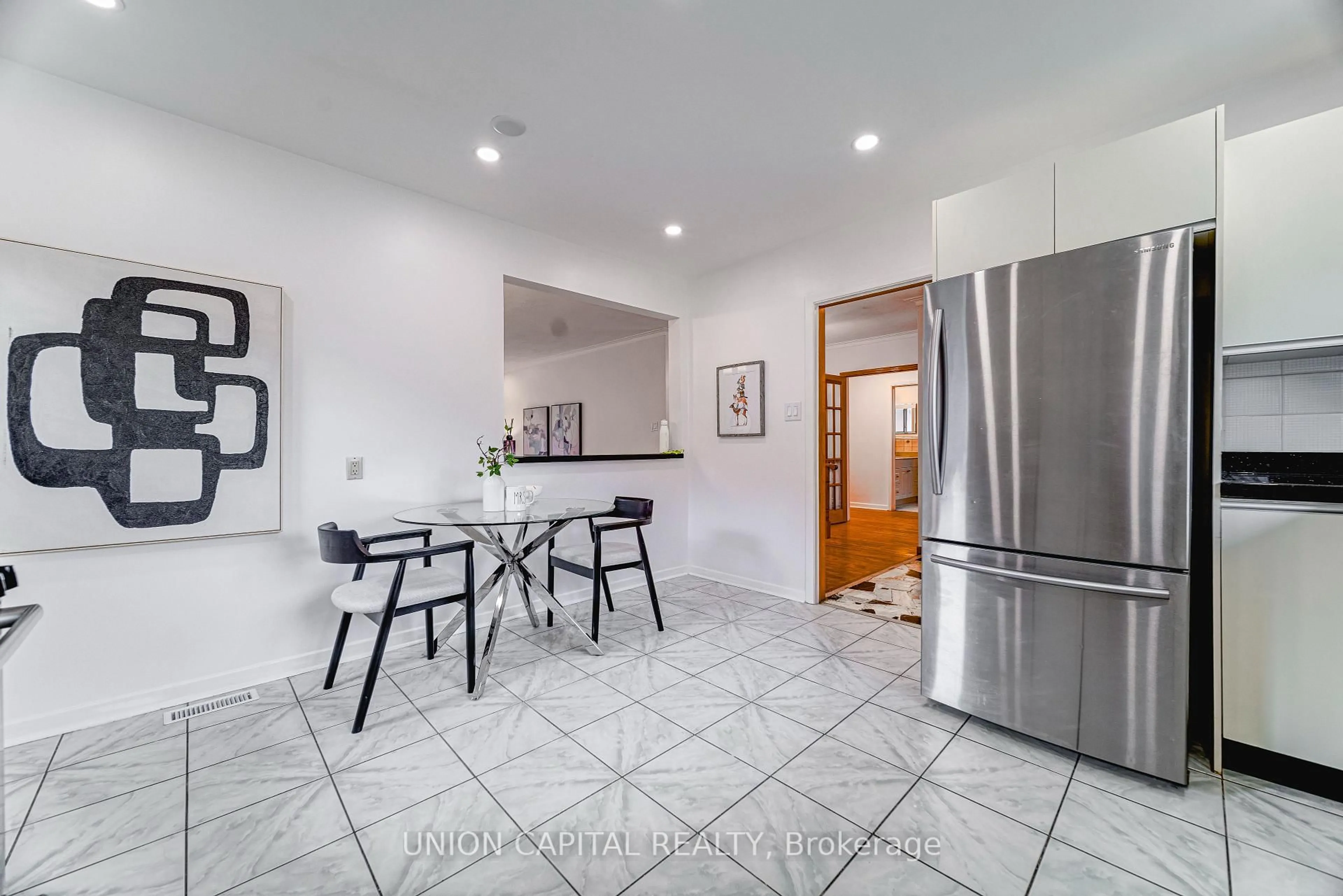 Open concept kitchen, ceramic/tile floor for 483 Huntingwood Dr, Toronto Ontario M1W 1G5