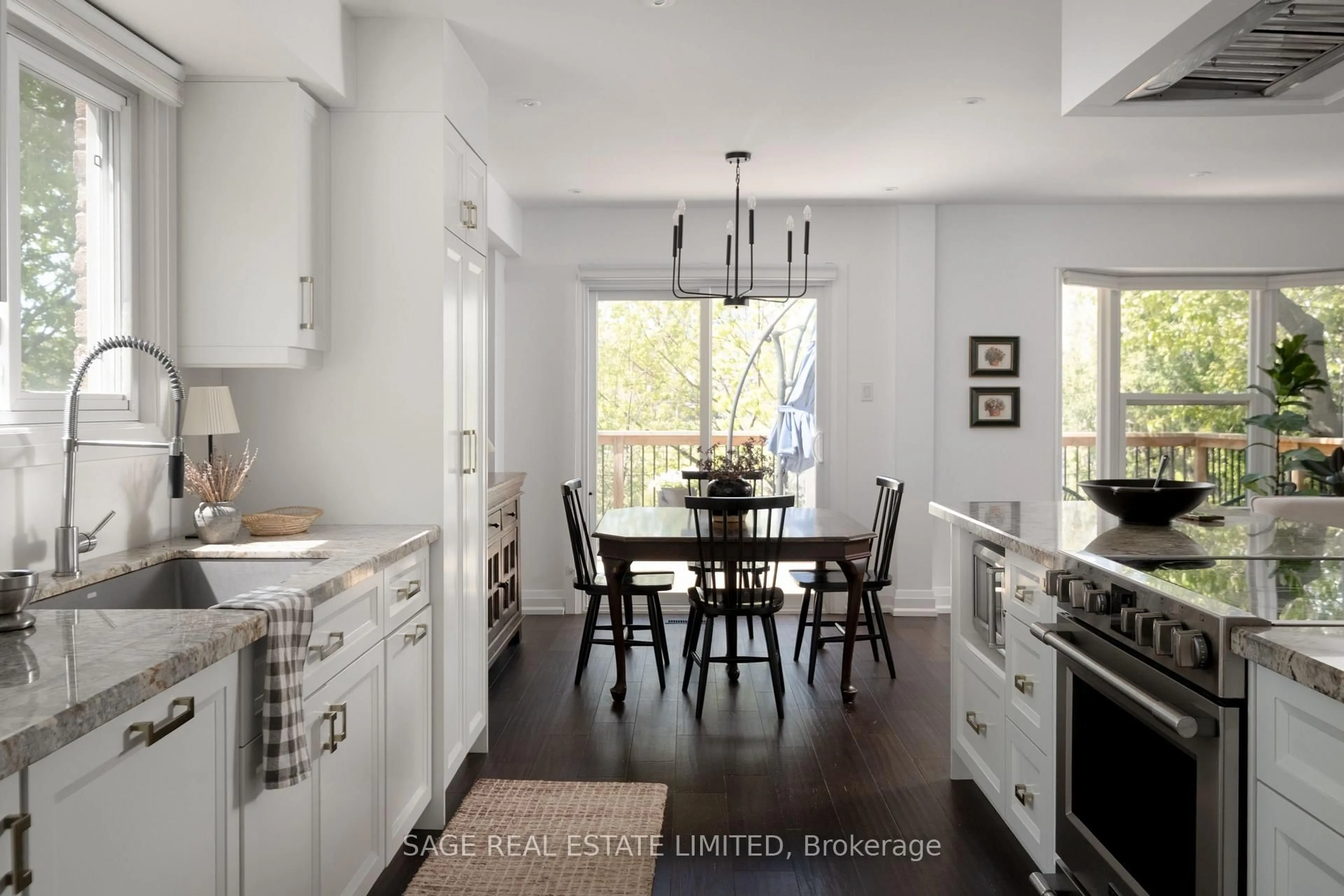 Open concept kitchen, wood/laminate floor for 34 Tambrook Dr, Toronto Ontario M1W 3L9