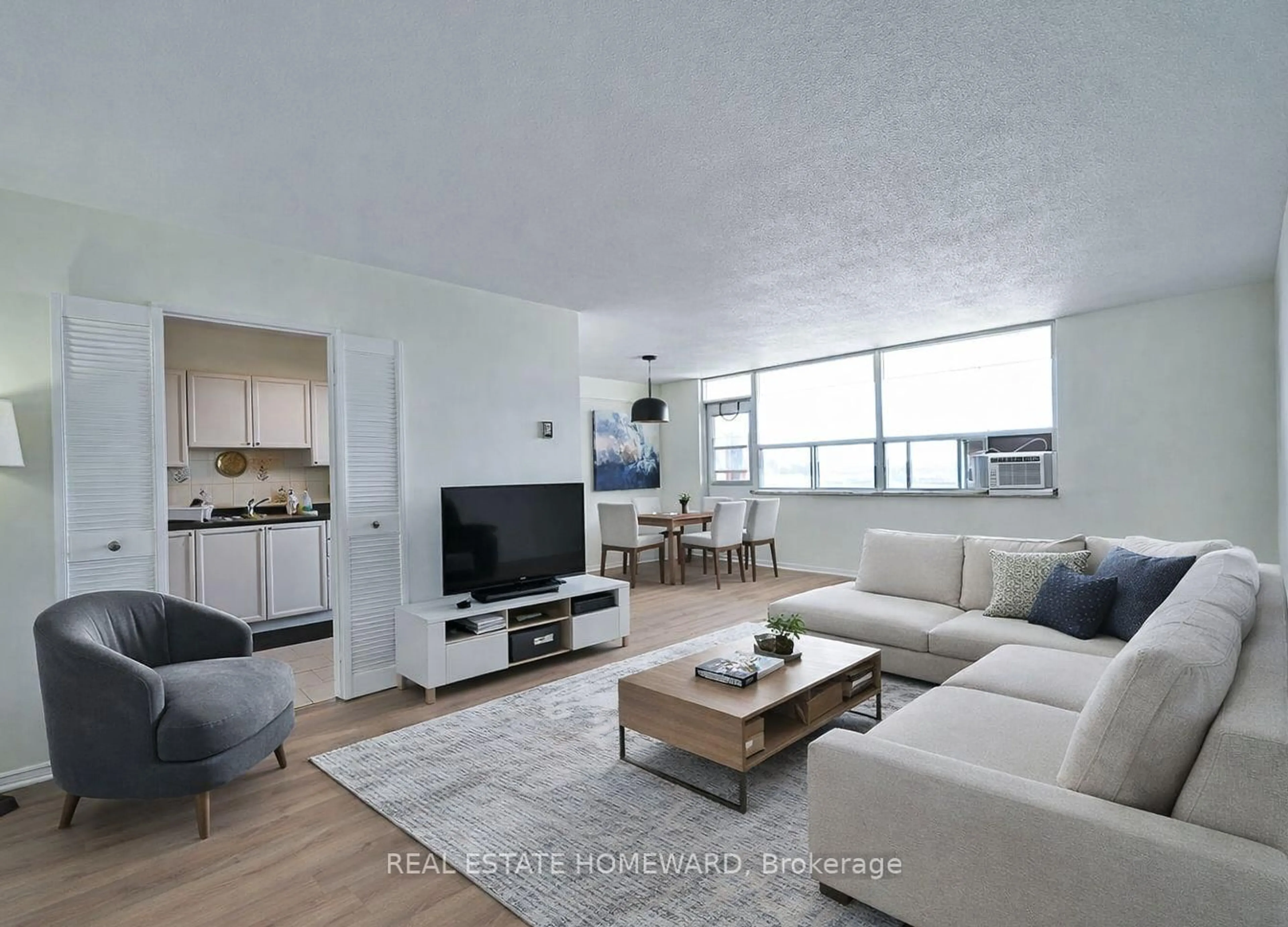 Living room with furniture, unknown for 2550 Pharmacy Ave #1015, Toronto Ontario M1W 1H9