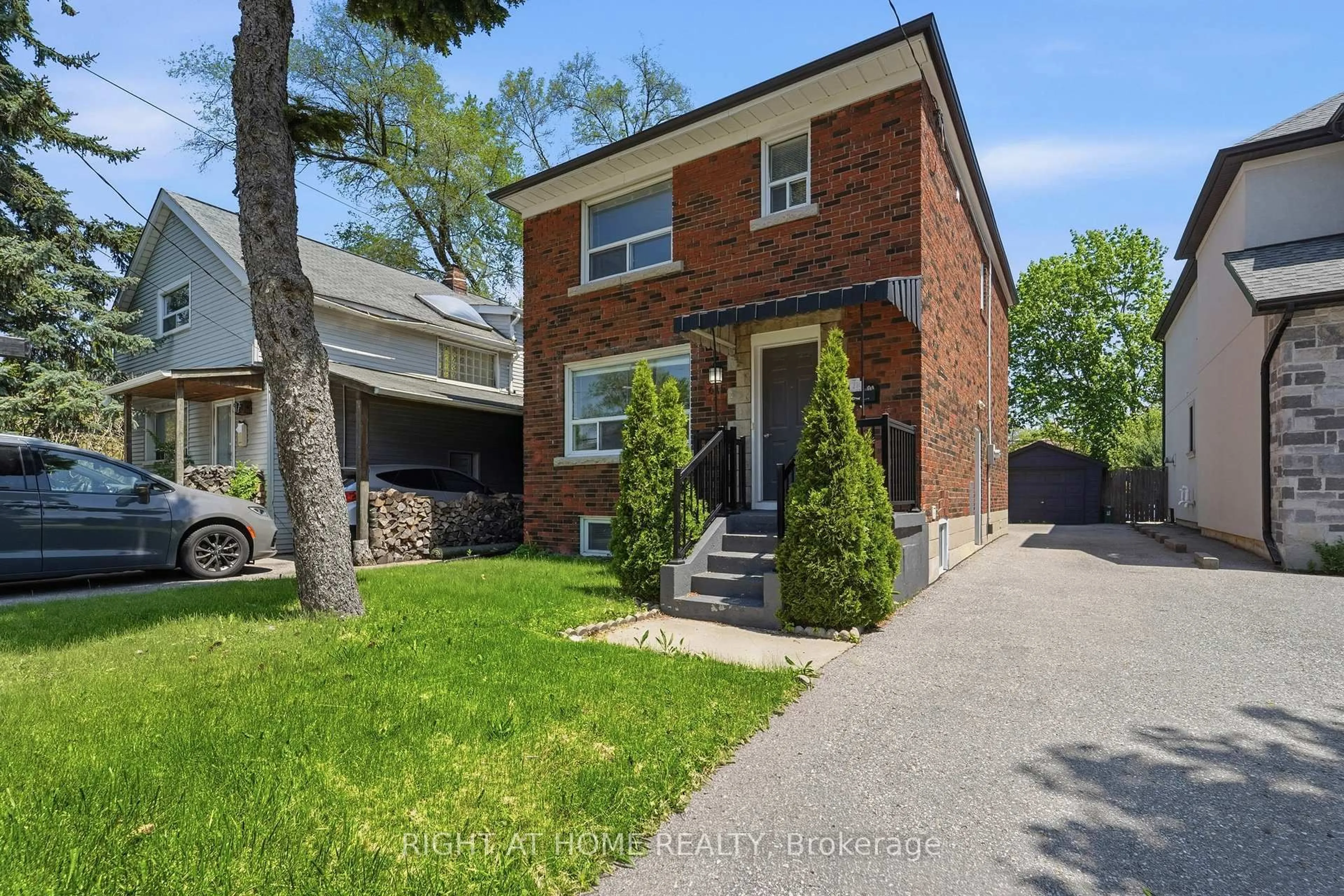 Home with brick exterior material, street for 615 Pharmacy Ave, Toronto Ontario M1L 3H1