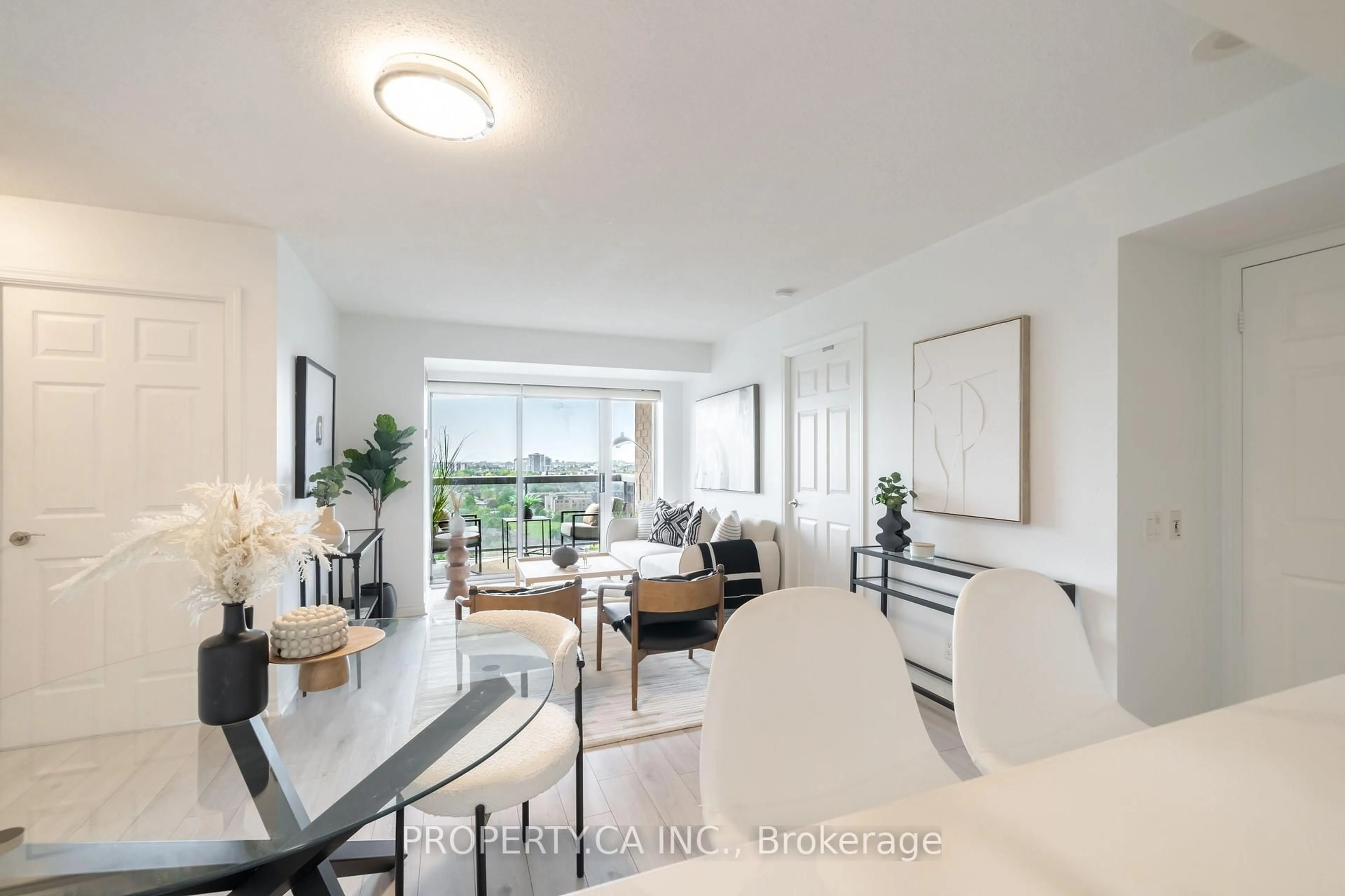 Living room with furniture, floor is not visible for 18 Mondeo Dr #1422, Toronto Ontario M1P 5C8