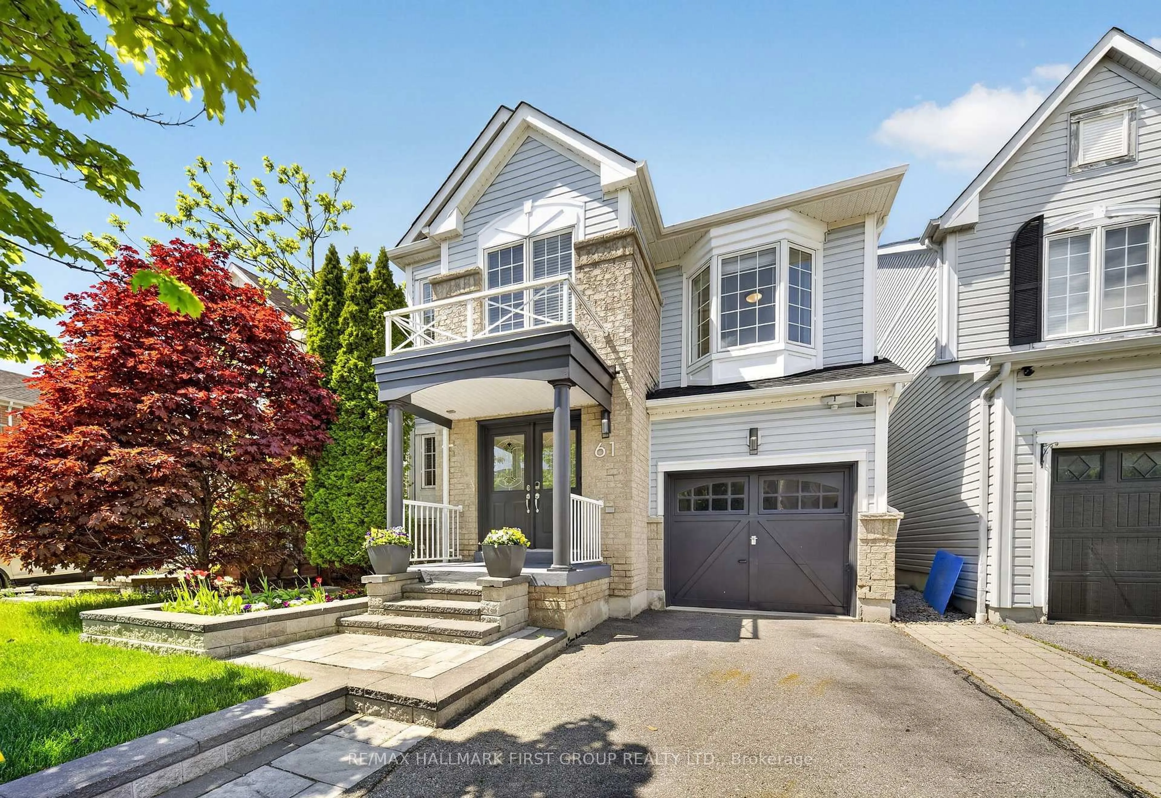 Home with vinyl exterior material, street for 61 Vanguard Dr, Whitby Ontario L1M 2P1