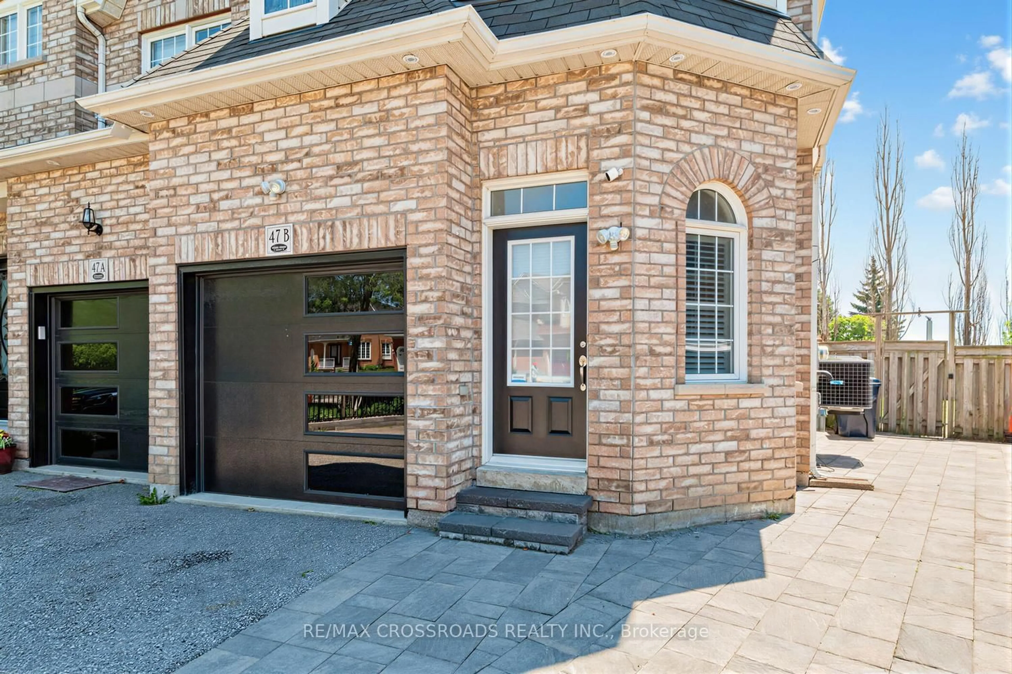Home with brick exterior material, street for 47B Carrera Blvd, Toronto Ontario M1P 5C4