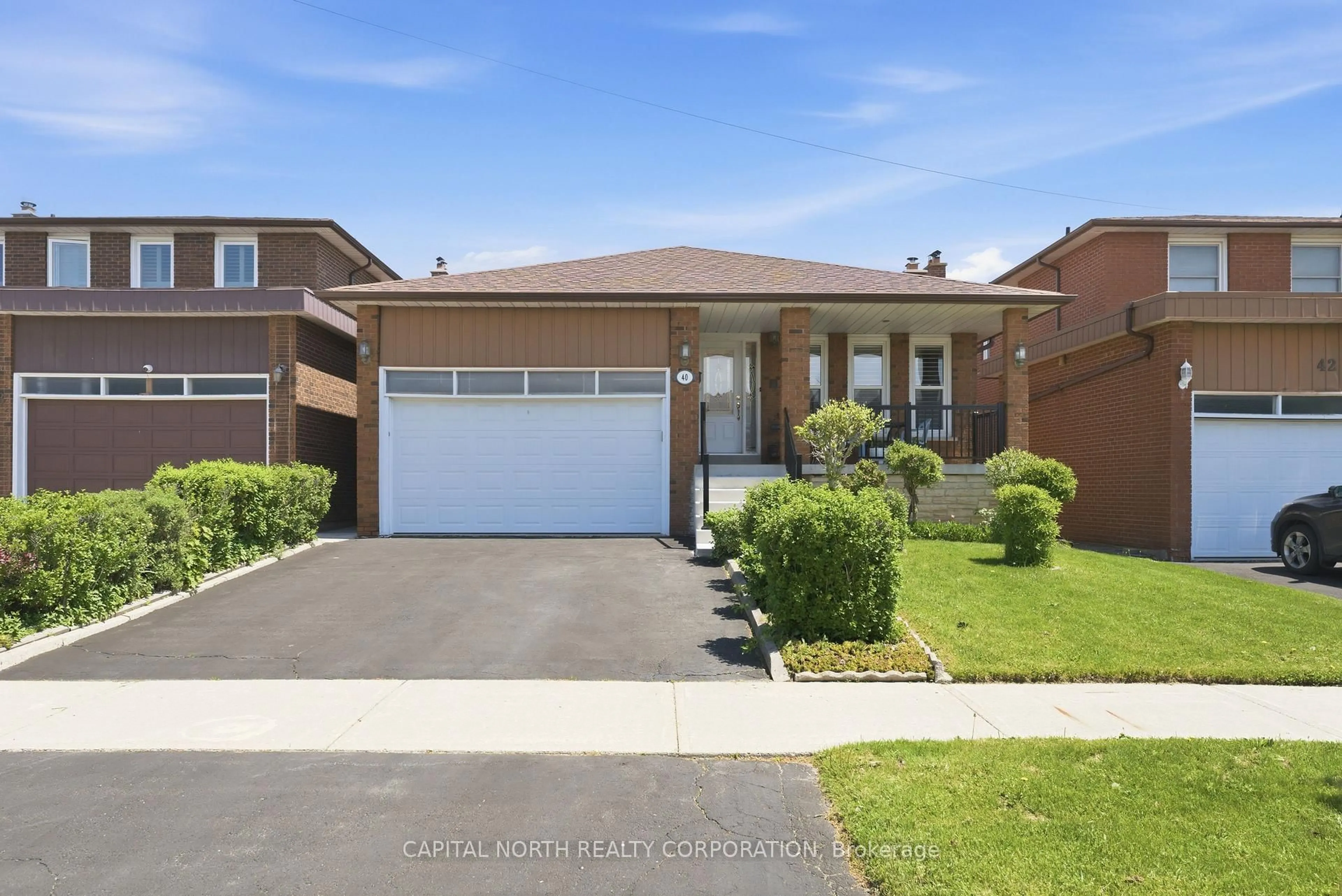 Home with brick exterior material, street for 40 Birdwood Crt, Toronto Ontario M1W 3K2