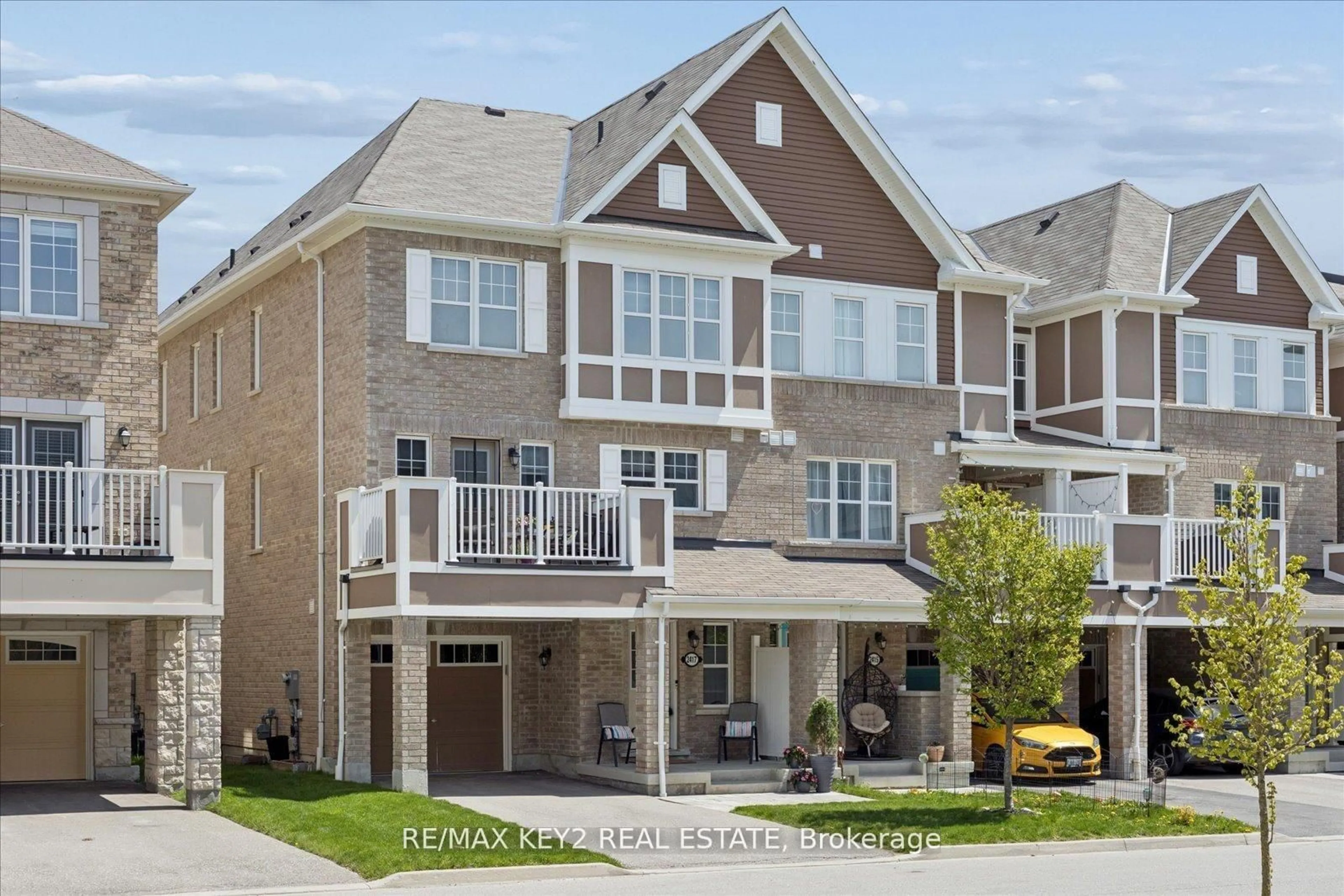Home with brick exterior material, street for 2417 Fall Harvest Cres, Pickering Ontario L1X 0G1