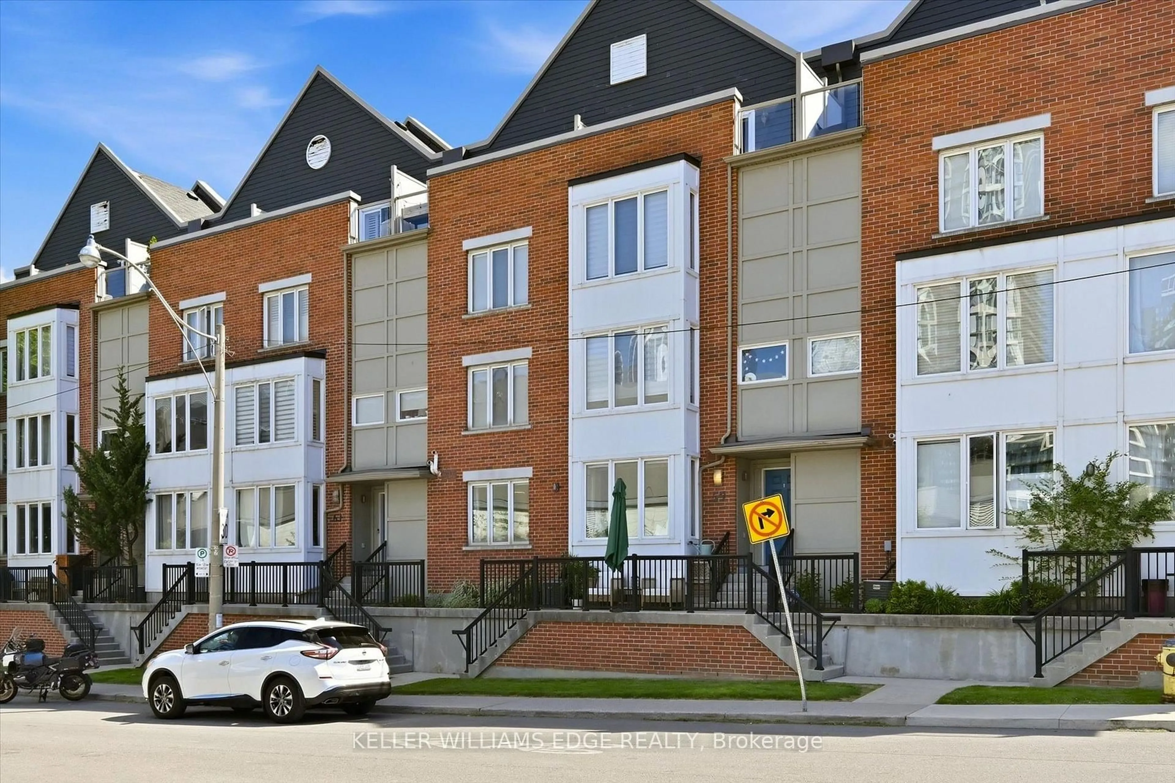 Home with brick exterior material, street for 59 Carroll St, Toronto Ontario M4M 3G2