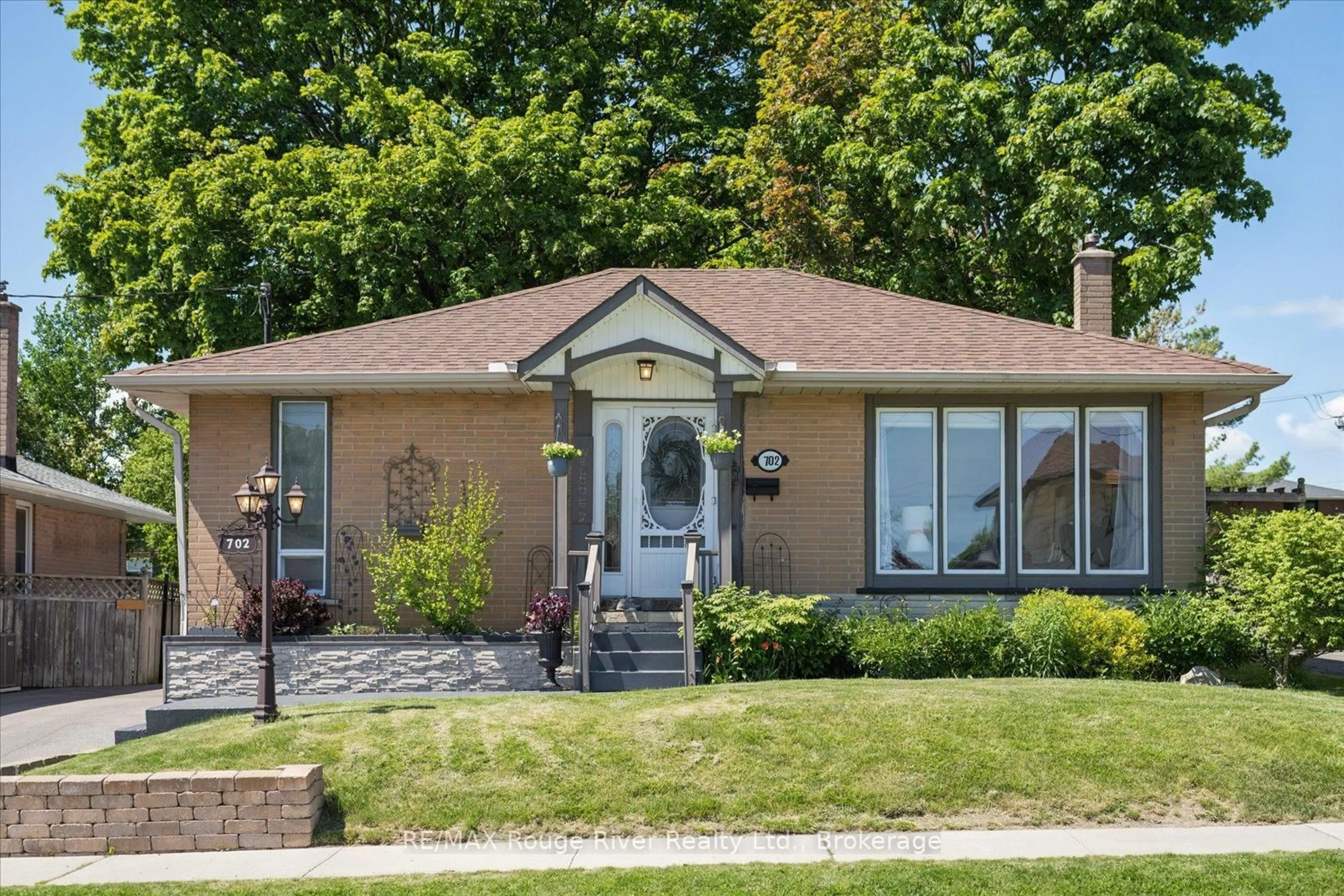 Home with brick exterior material, street for 702 Gilbert St, Whitby Ontario L1N 1S2