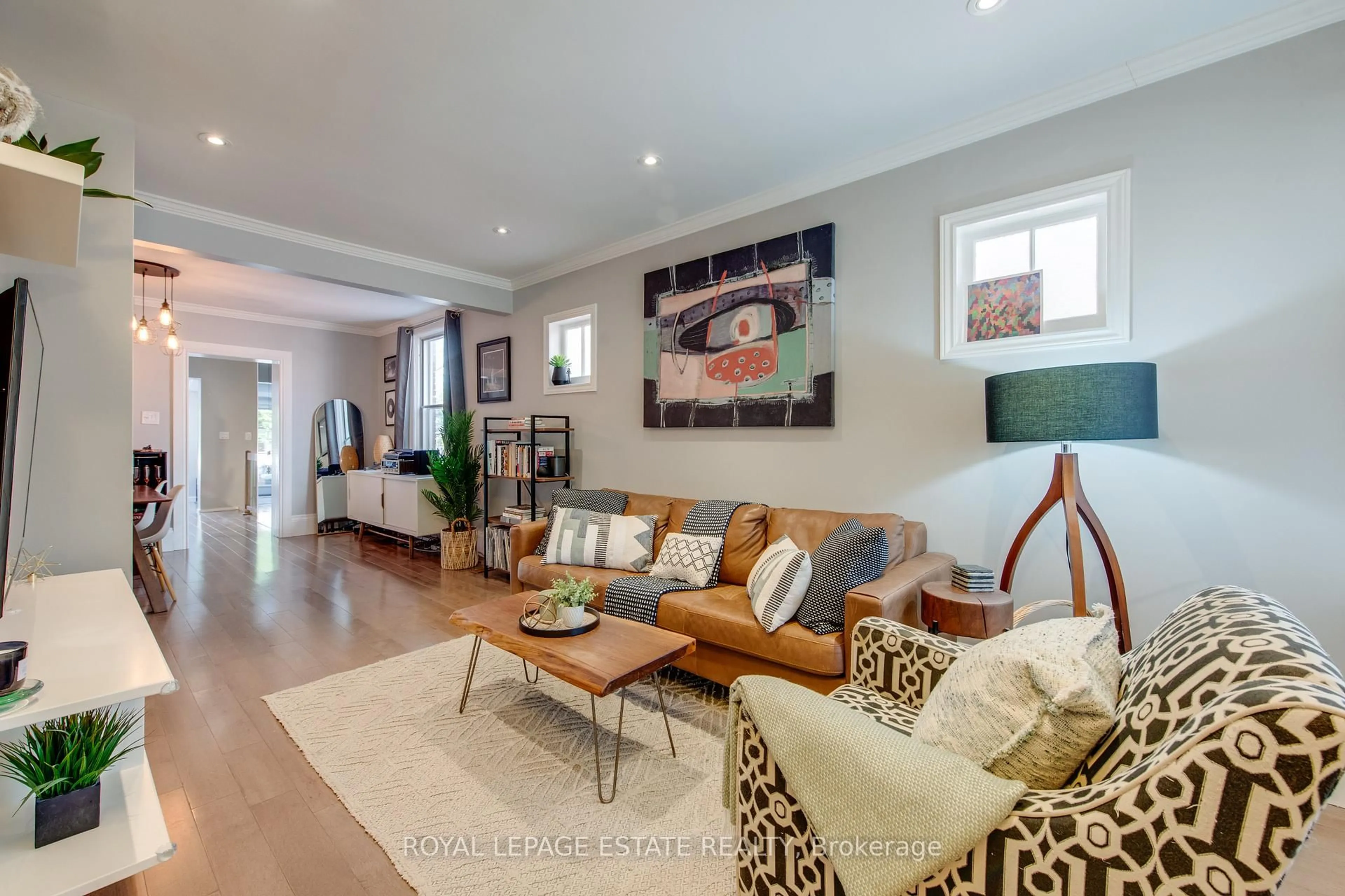 Living room with furniture, unknown for 138 Woodmount Ave, Toronto Ontario M4C 3Y8