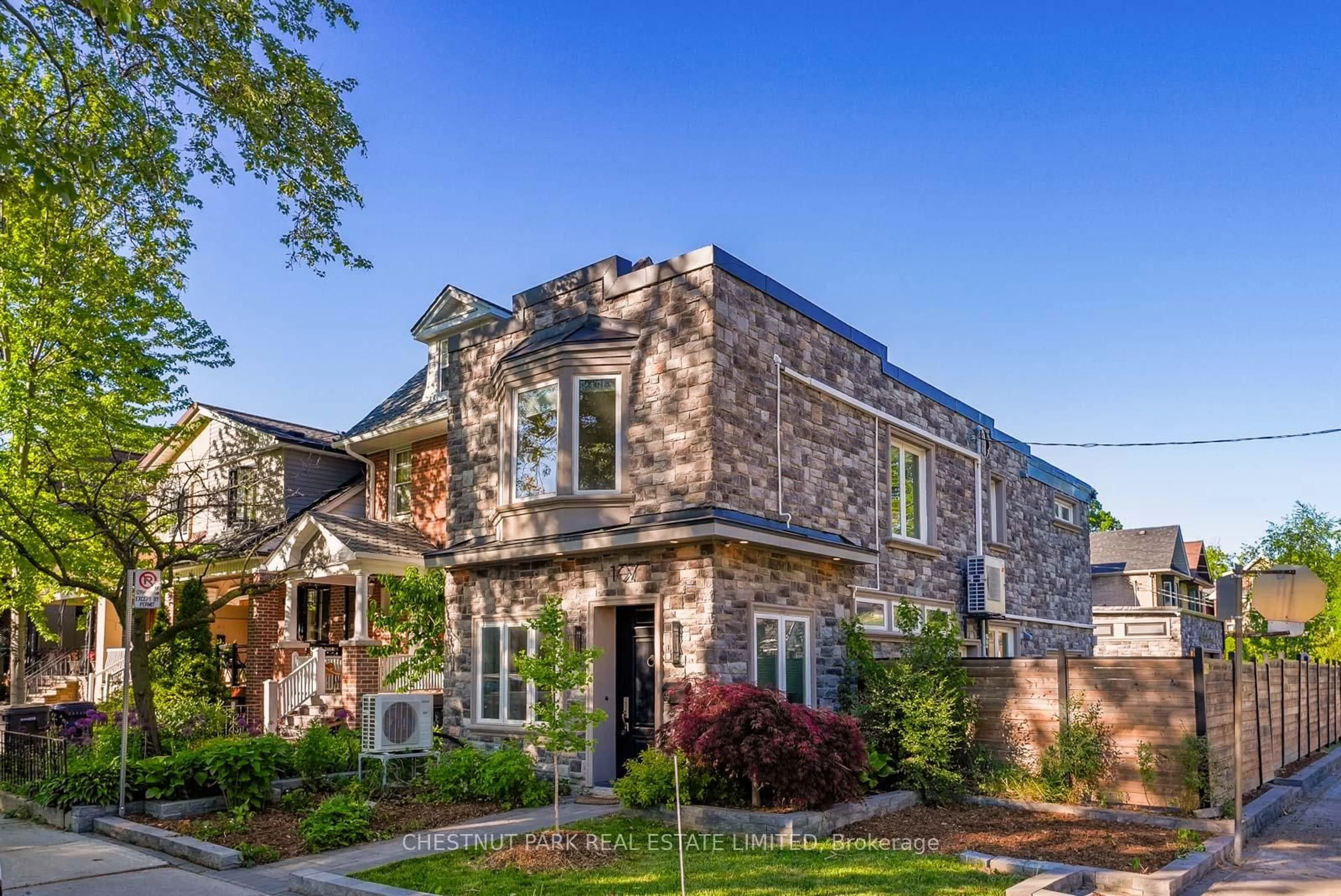 Home with brick exterior material, street for 107 Eaton Ave, Toronto Ontario M4J 2Z6