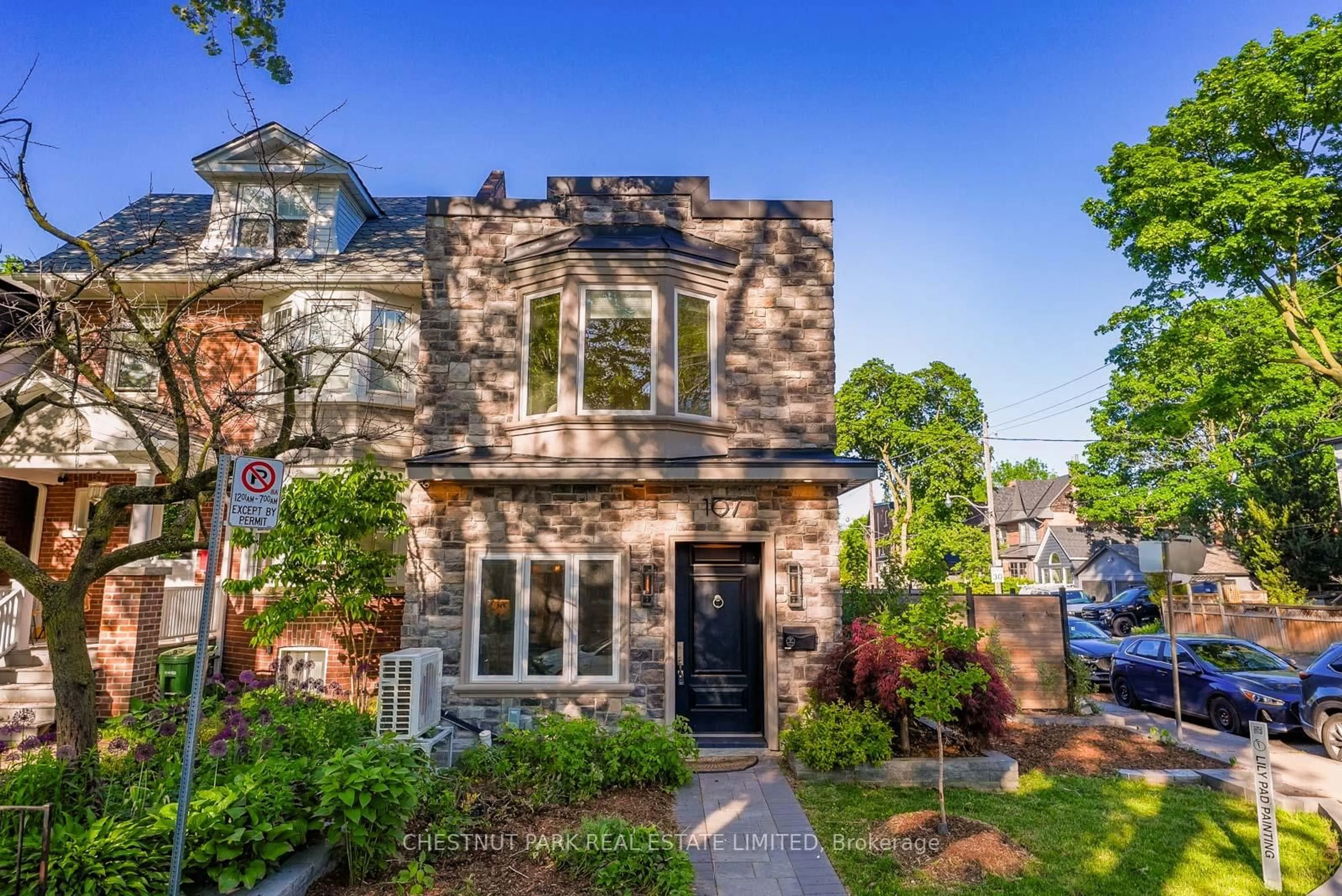 Home with brick exterior material, street for 107 Eaton Ave, Toronto Ontario M4J 2Z6