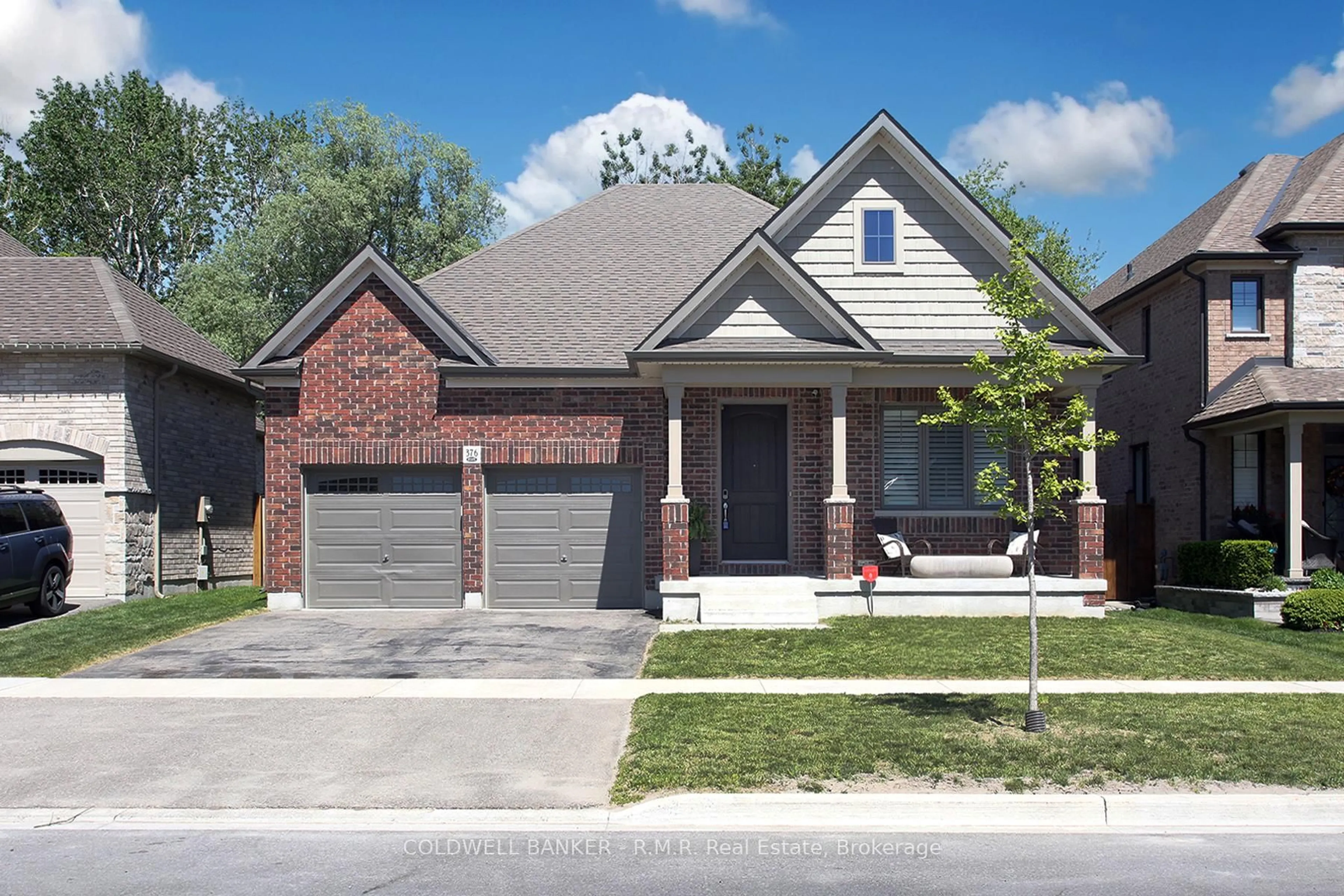 Home with brick exterior material, street for 376 Northglen Blvd, Clarington Ontario L1C 7E2