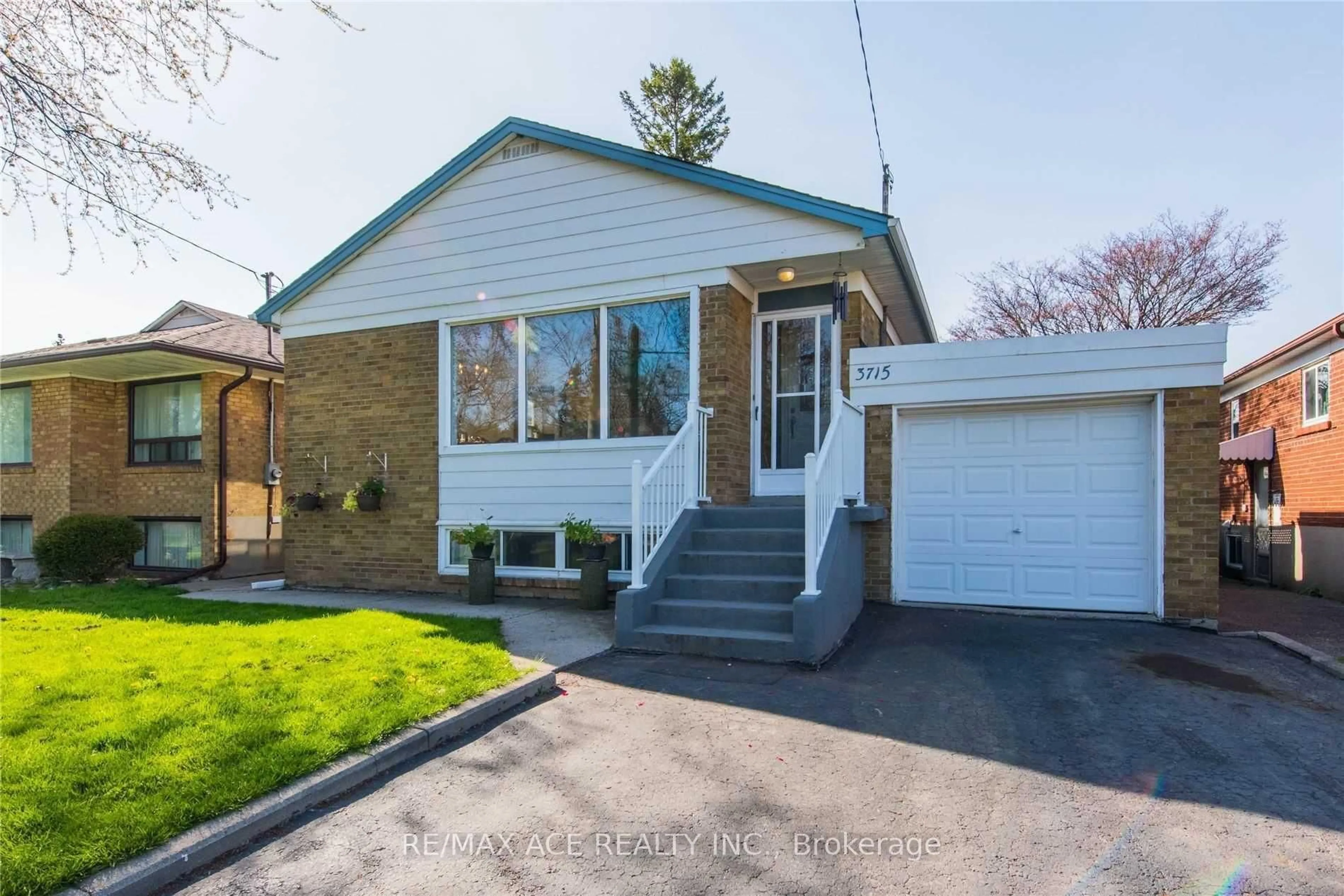Home with vinyl exterior material, street for 3715 St Clair Ave, Toronto Ontario M1M 1T5