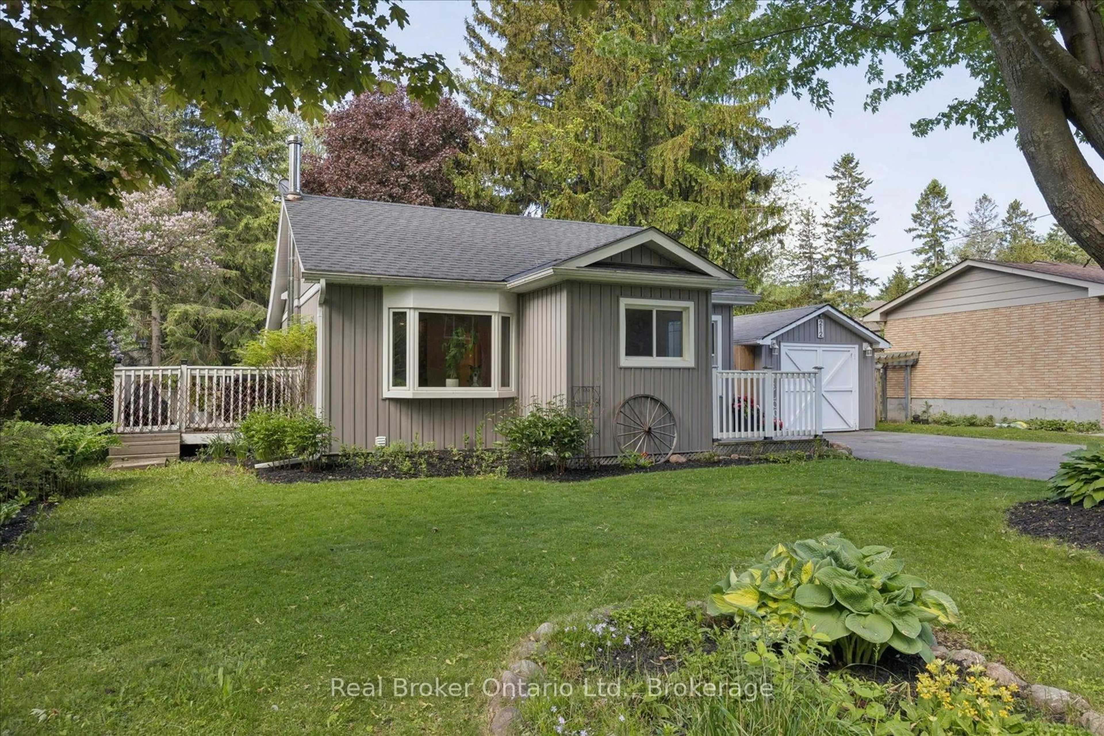 Home with vinyl exterior material, street for 212 Mill St, Clarington Ontario L1B 1J3