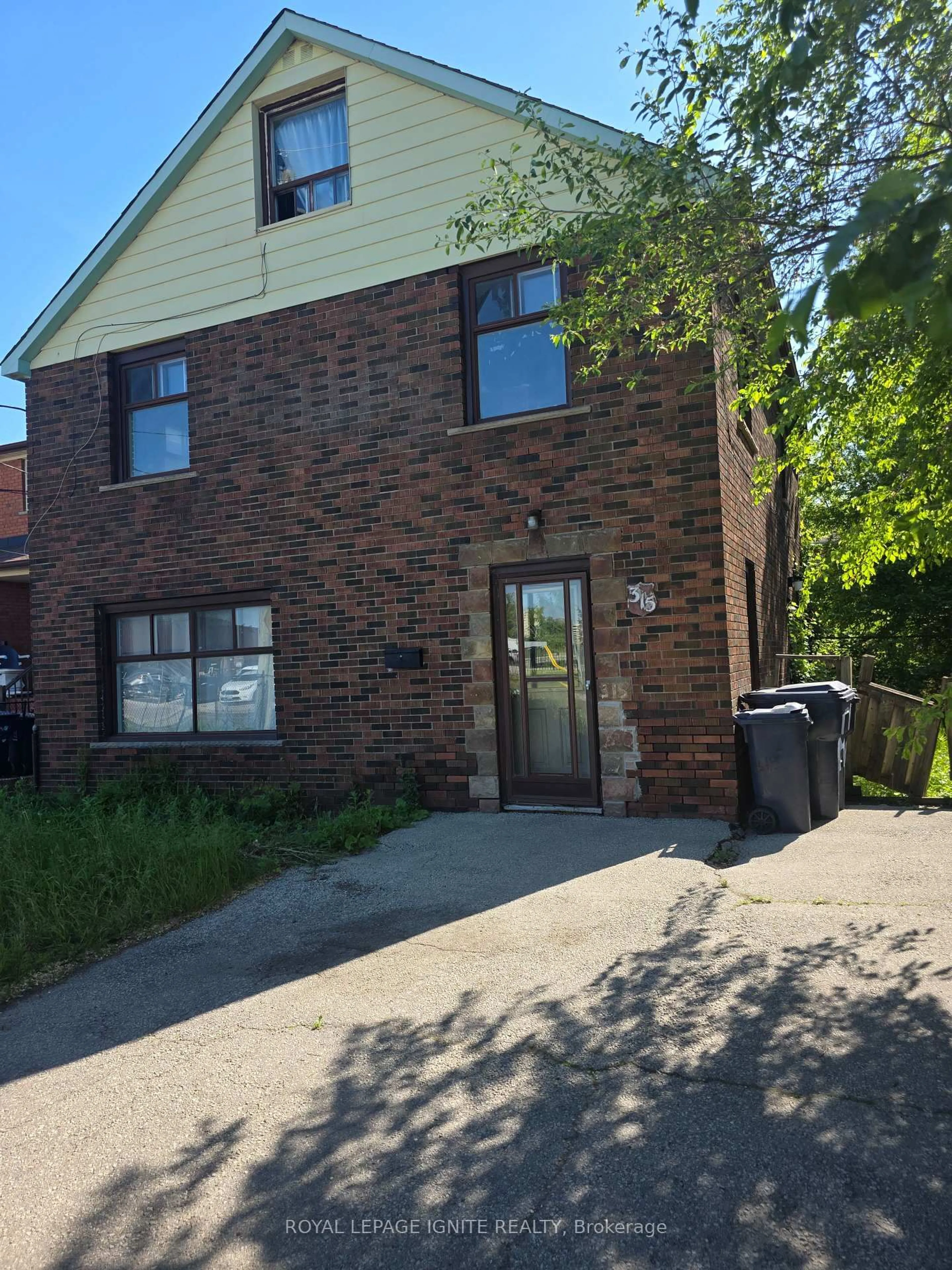 Home with brick exterior material, street for 315 Birchmount Rd, Toronto Ontario M1N 3K1