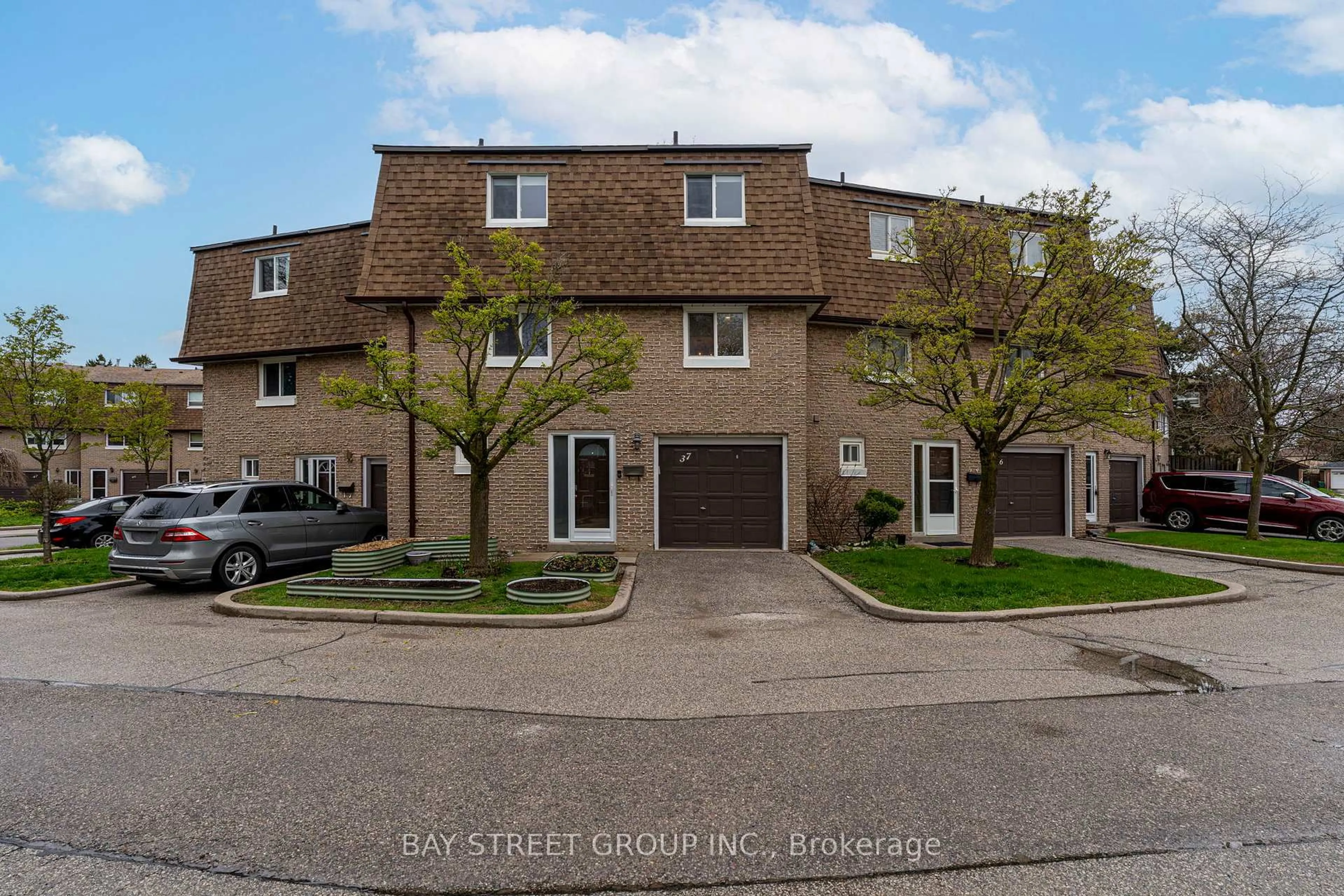 A pic from outside/outdoor area/front of a property/back of a property/a pic from drone, street for 671 Huntingwood Dr #37, Toronto Ontario M1W 1H6