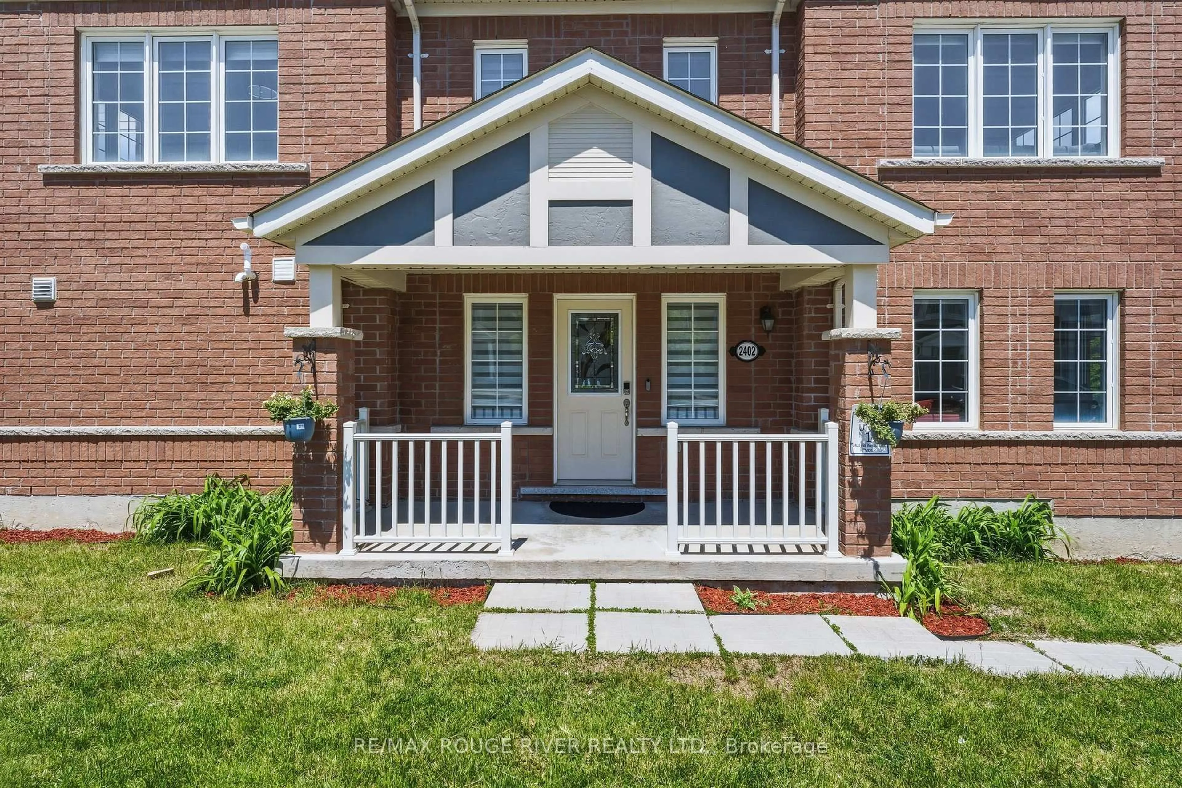 Home with brick exterior material, street for 2402 Fall Harvest Cres, Pickering Ontario L1X 0G2