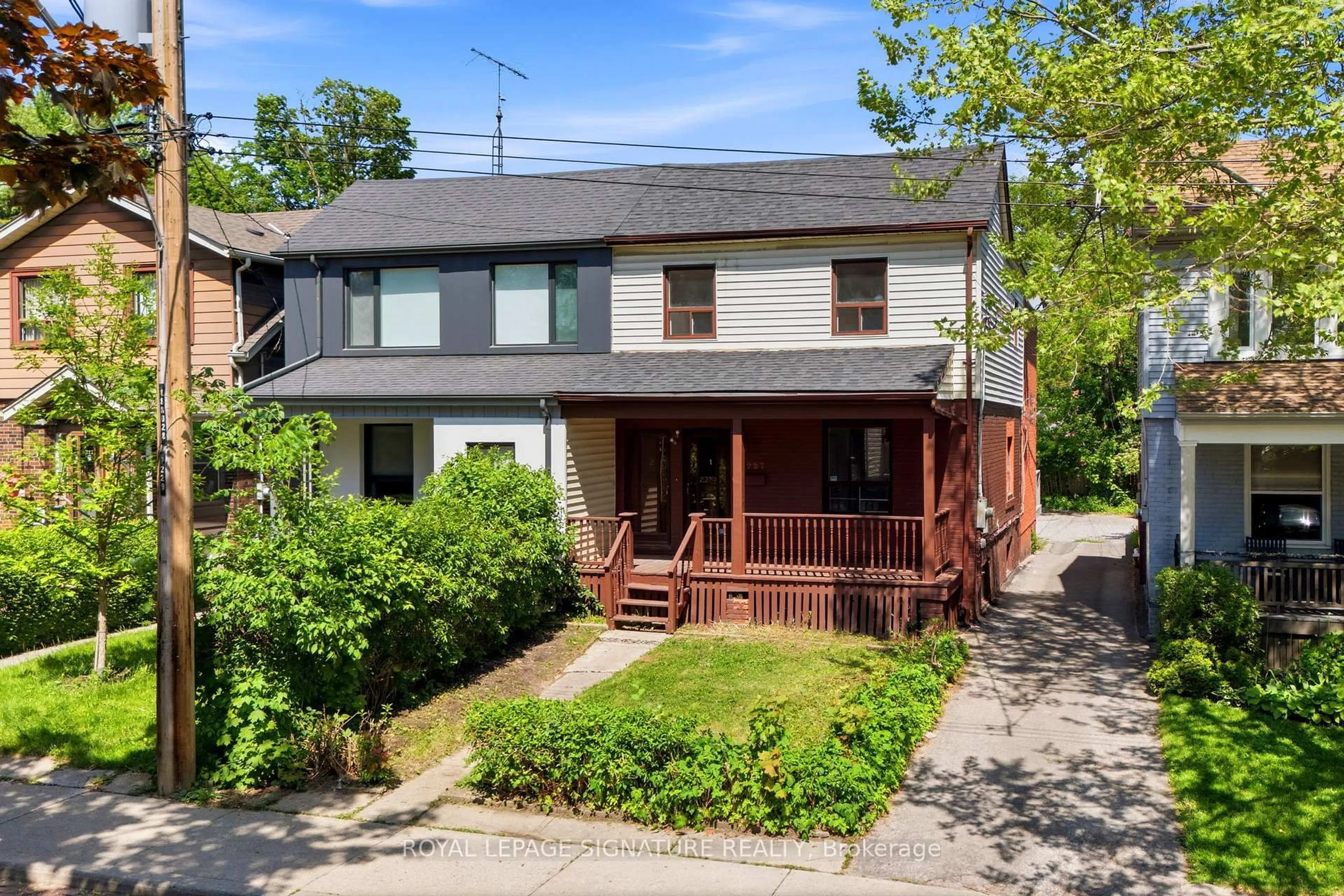 A pic from outside/outdoor area/front of a property/back of a property/a pic from drone, street for 227 Woodfield Rd, Toronto Ontario M4L 2W8