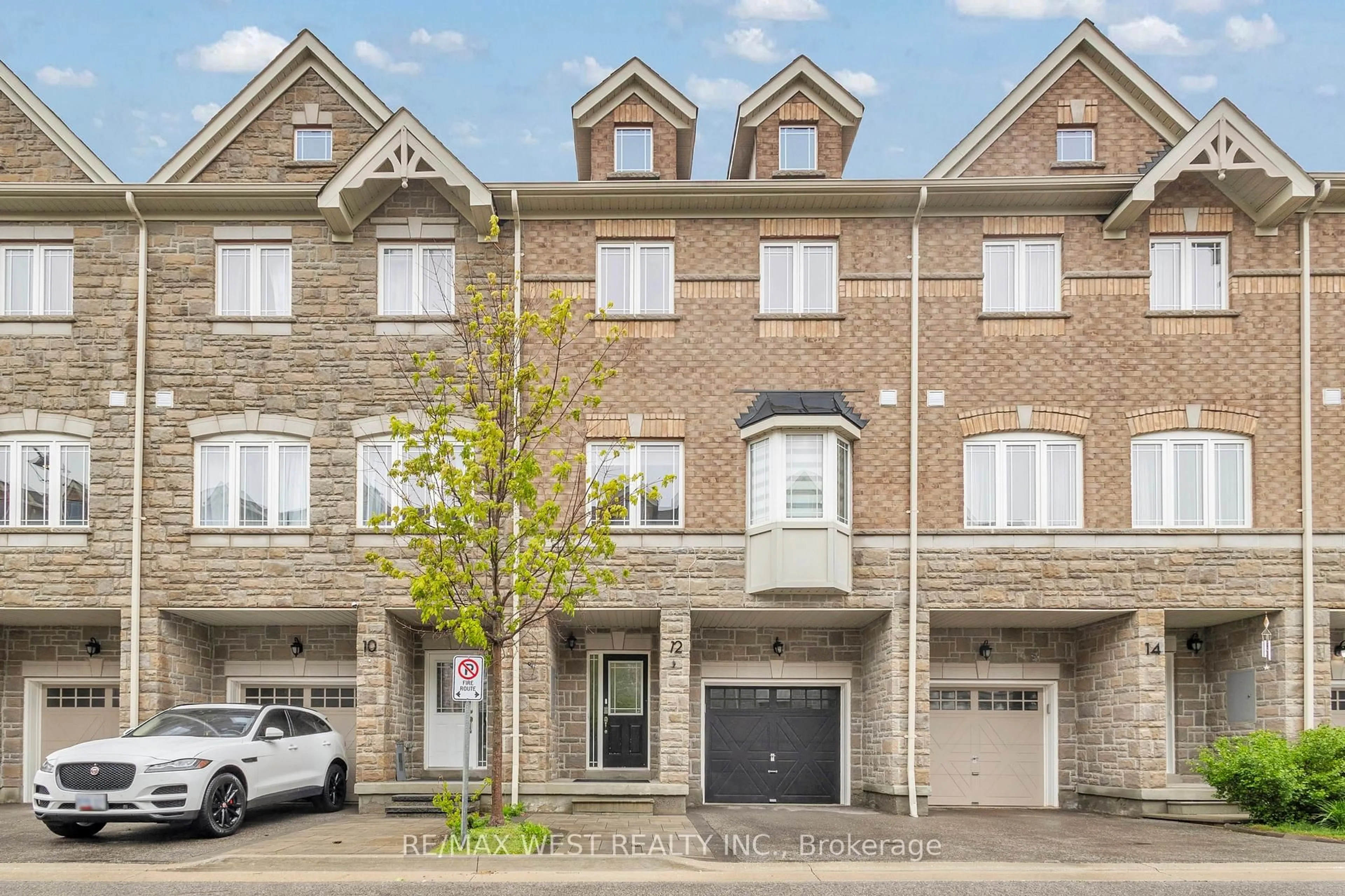 Home with brick exterior material, street for 12 Waterstone Way, Whitby Ontario L1N 0M3