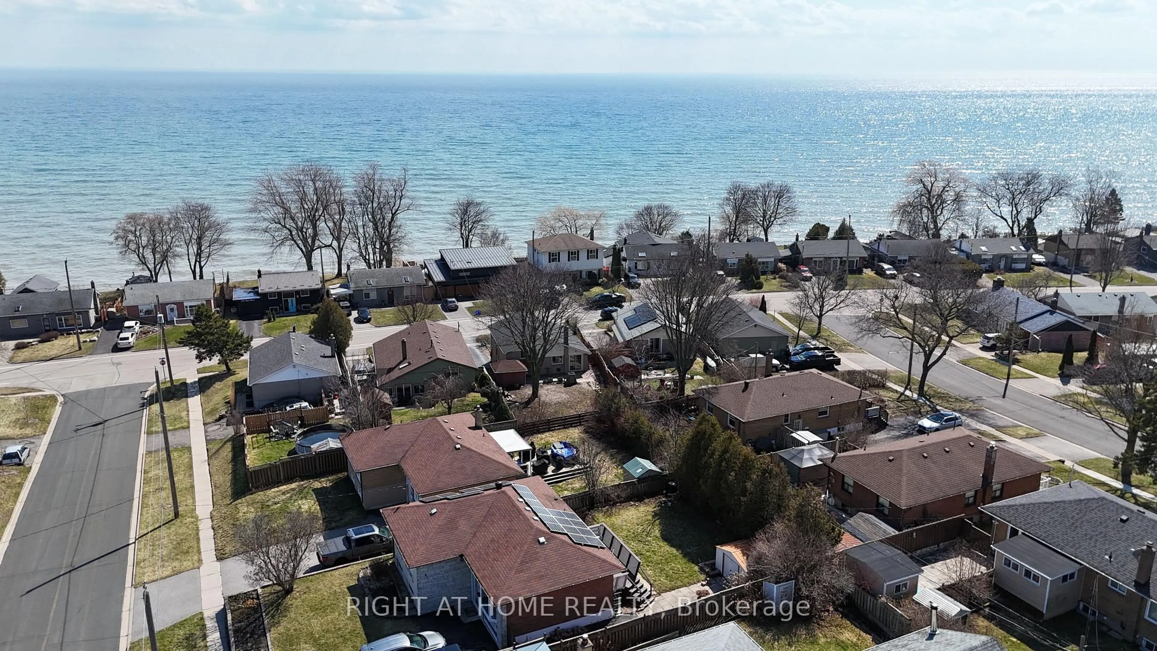 A pic from outside/outdoor area/front of a property/back of a property/a pic from drone, water/lake/river/ocean view for 740 Stone St, Oshawa Ontario L1J 1A6