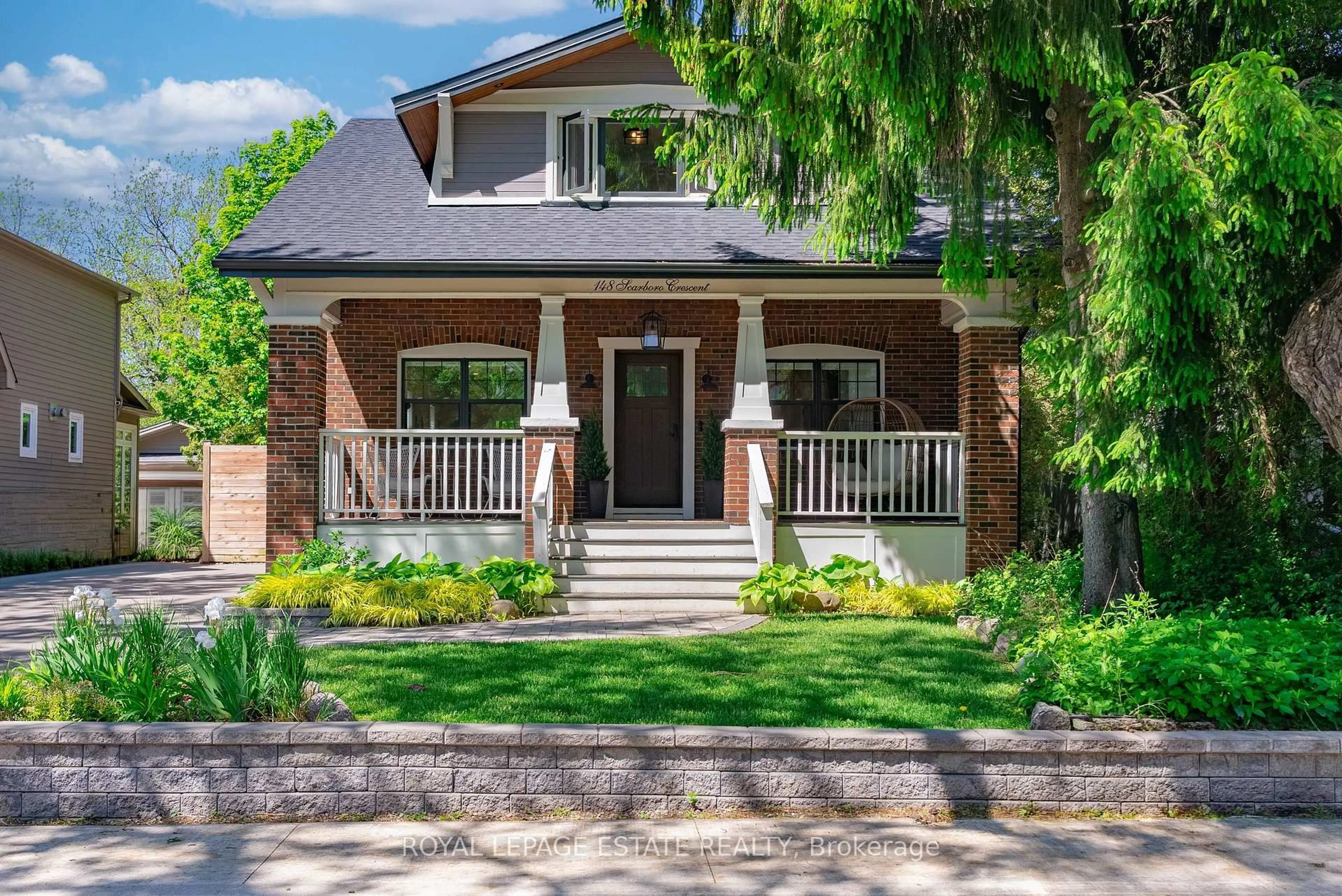 Home with brick exterior material, street for 148 Scarboro Cres, Toronto Ontario M1M 2J4