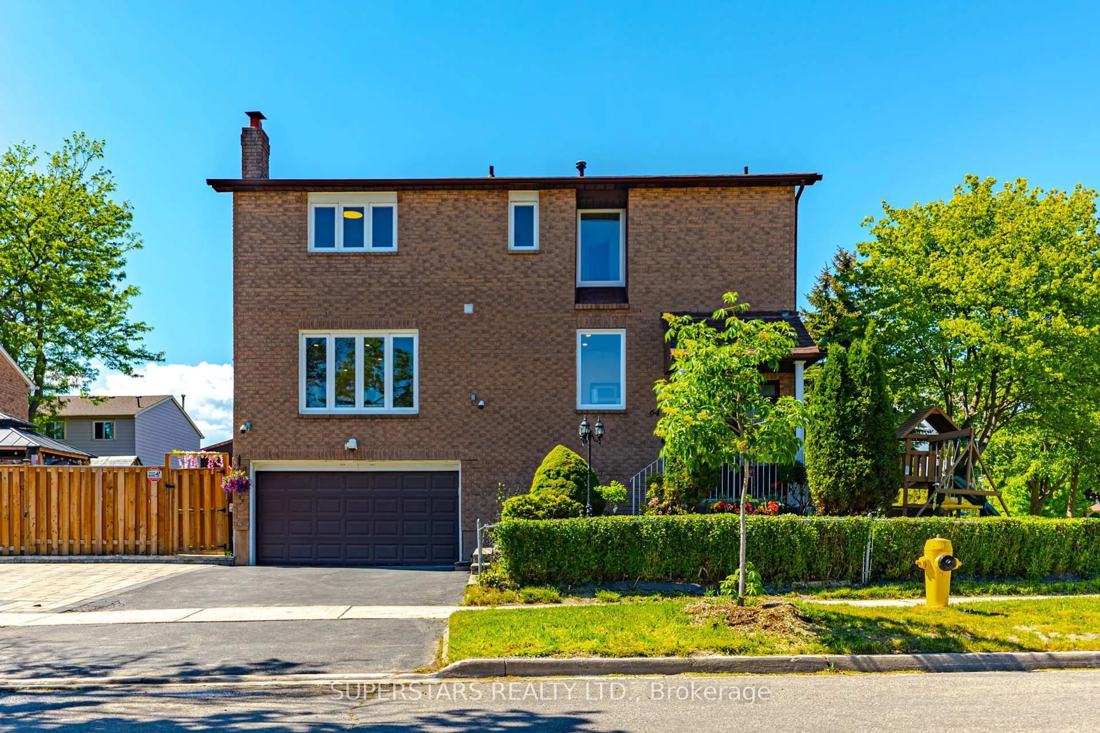Home with brick exterior material, street for 64 Tambrook Dr, Toronto Ontario M1W 3L9