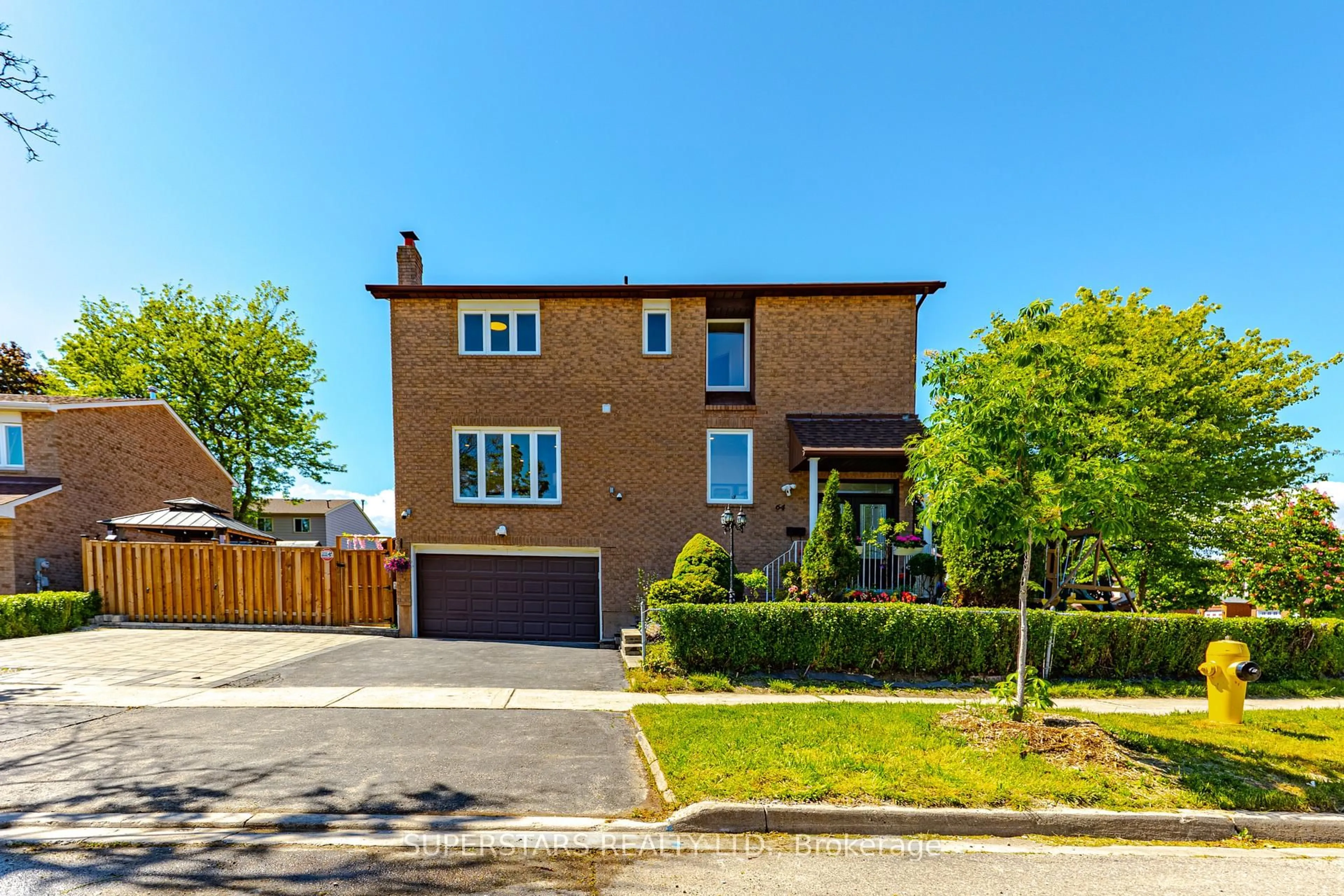 Home with brick exterior material, street for 64 Tambrook Dr, Toronto Ontario M1W 3L9