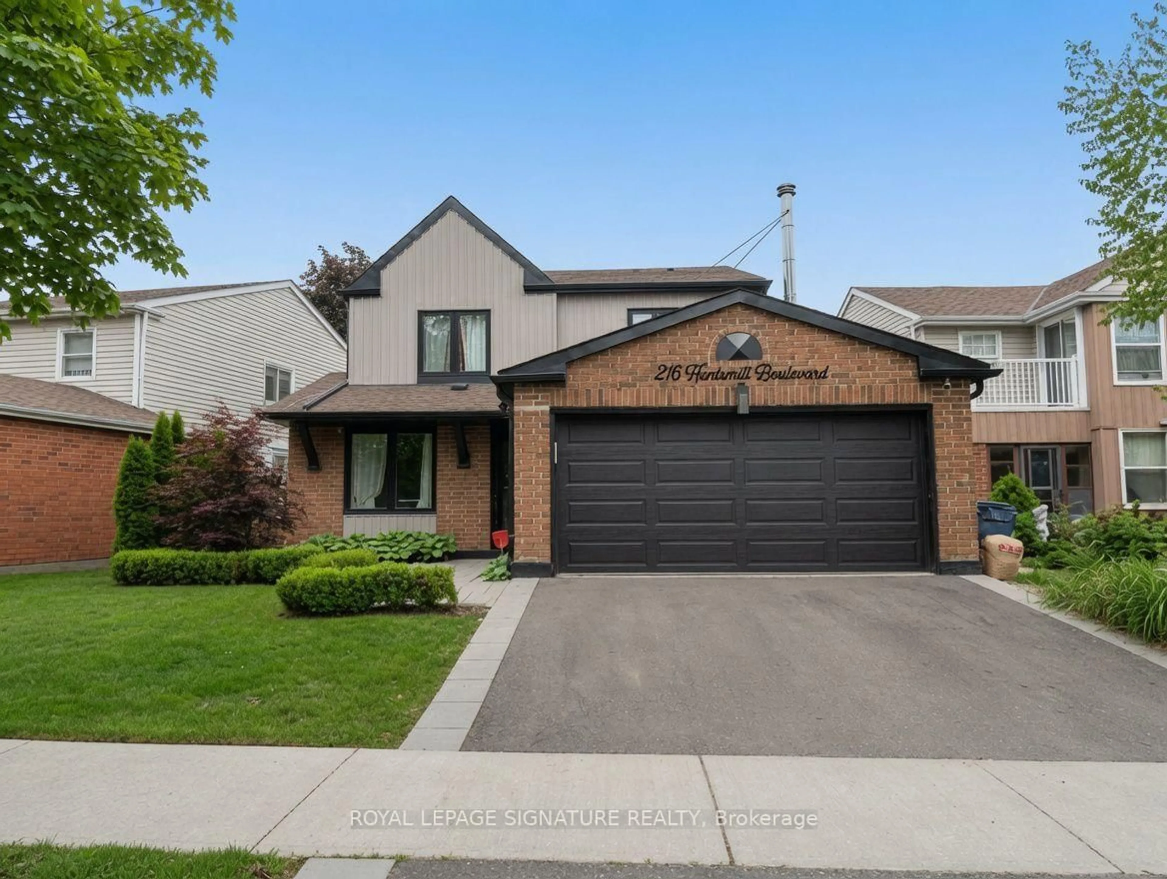 Home with brick exterior material, street for 216 Huntsmill Blvd, Toronto Ontario M1W 3E1