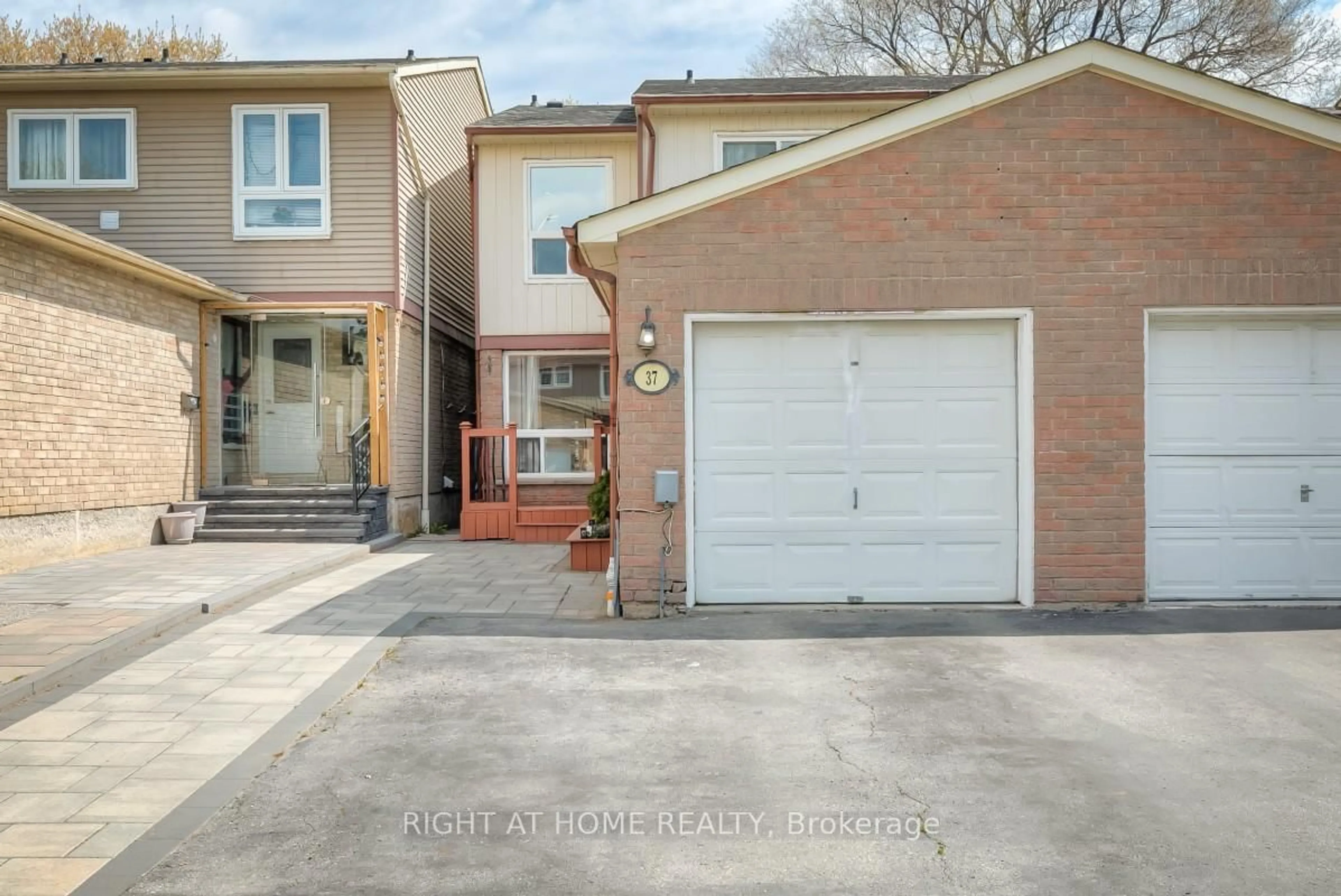 Home with brick exterior material, street for 37 McKnight Dr, Toronto Ontario M1B 2Z4