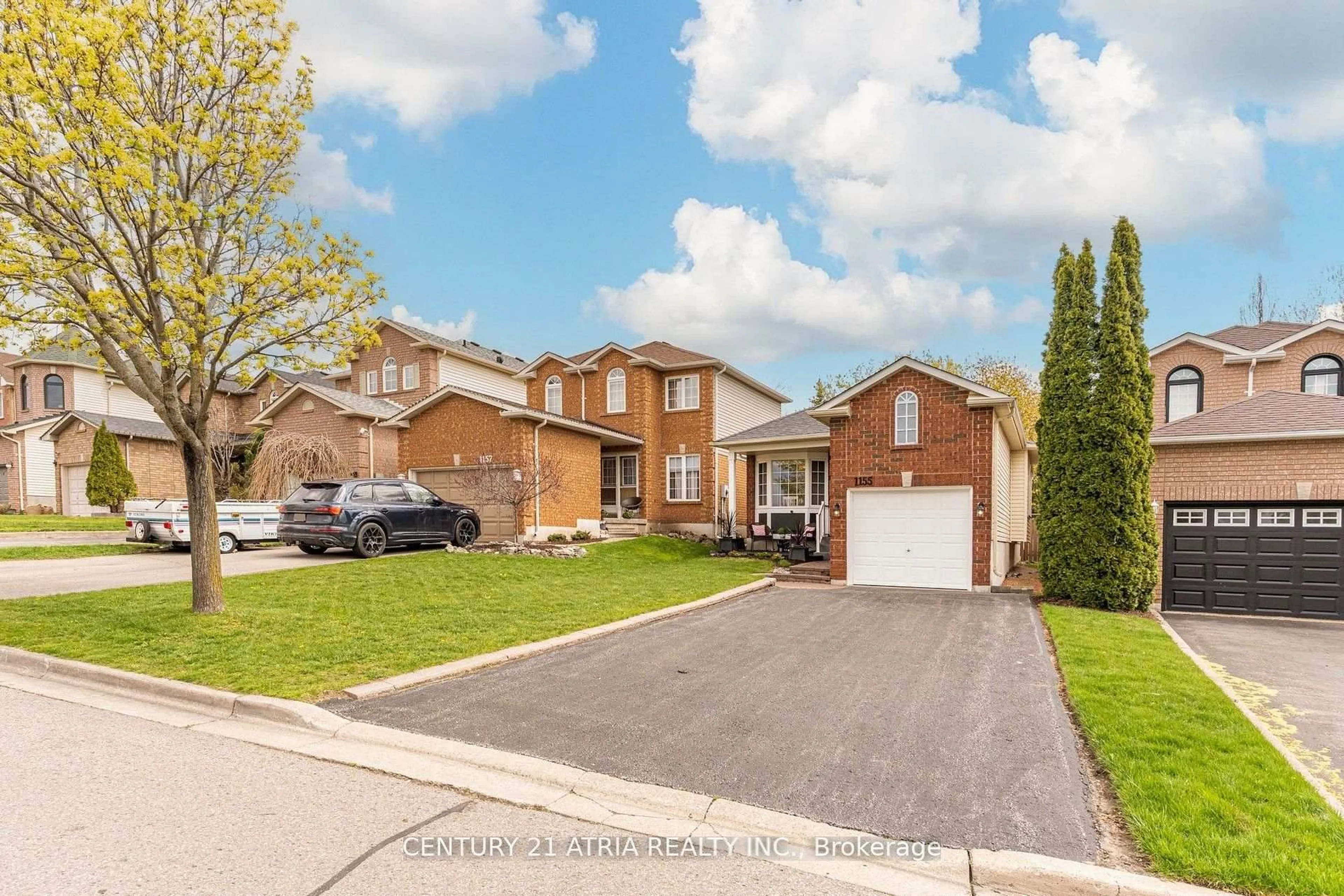 Home with brick exterior material, street for 1155 Ridgemount Blvd, Oshawa Ontario L1K 2L2