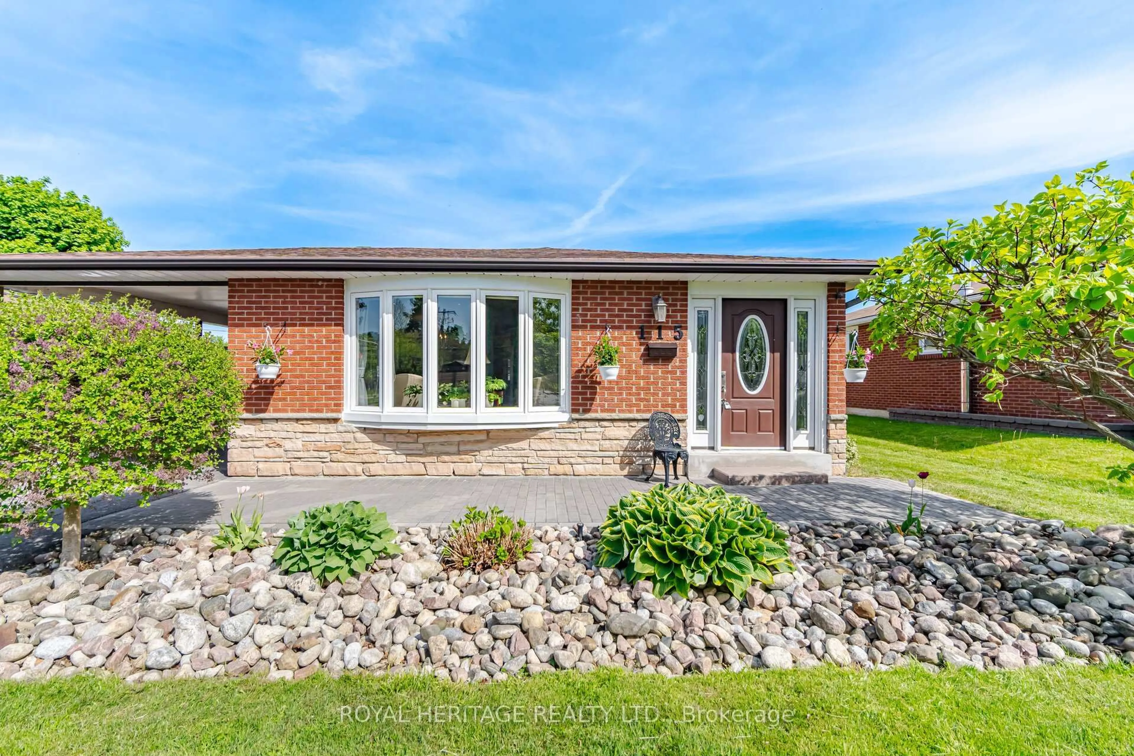 Home with brick exterior material, street for 115 Clover Ridge Dr, Ajax Ontario L1S 1H1