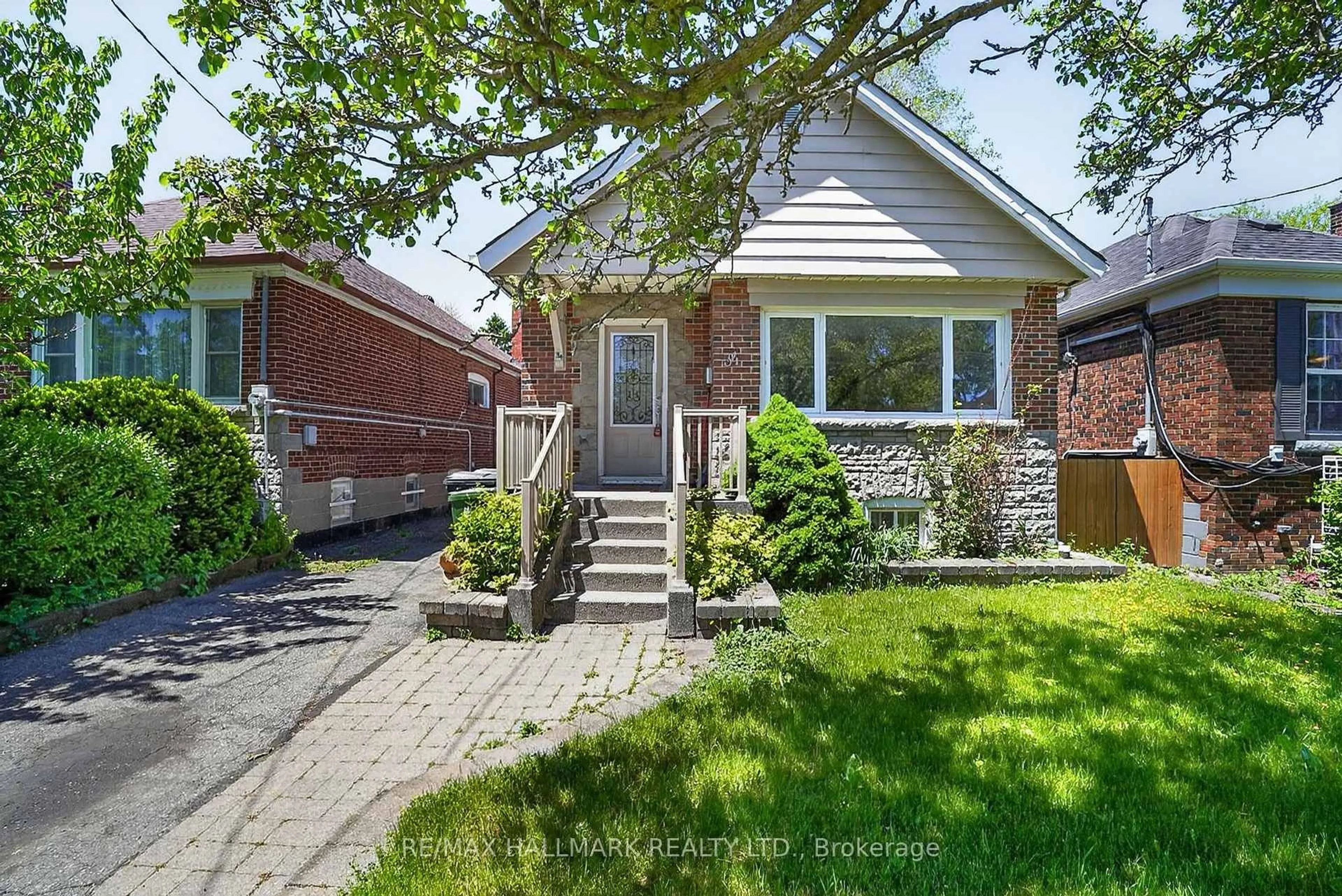Home with brick exterior material, street for 34 Clonmore Dr, Toronto Ontario M1N 1X5