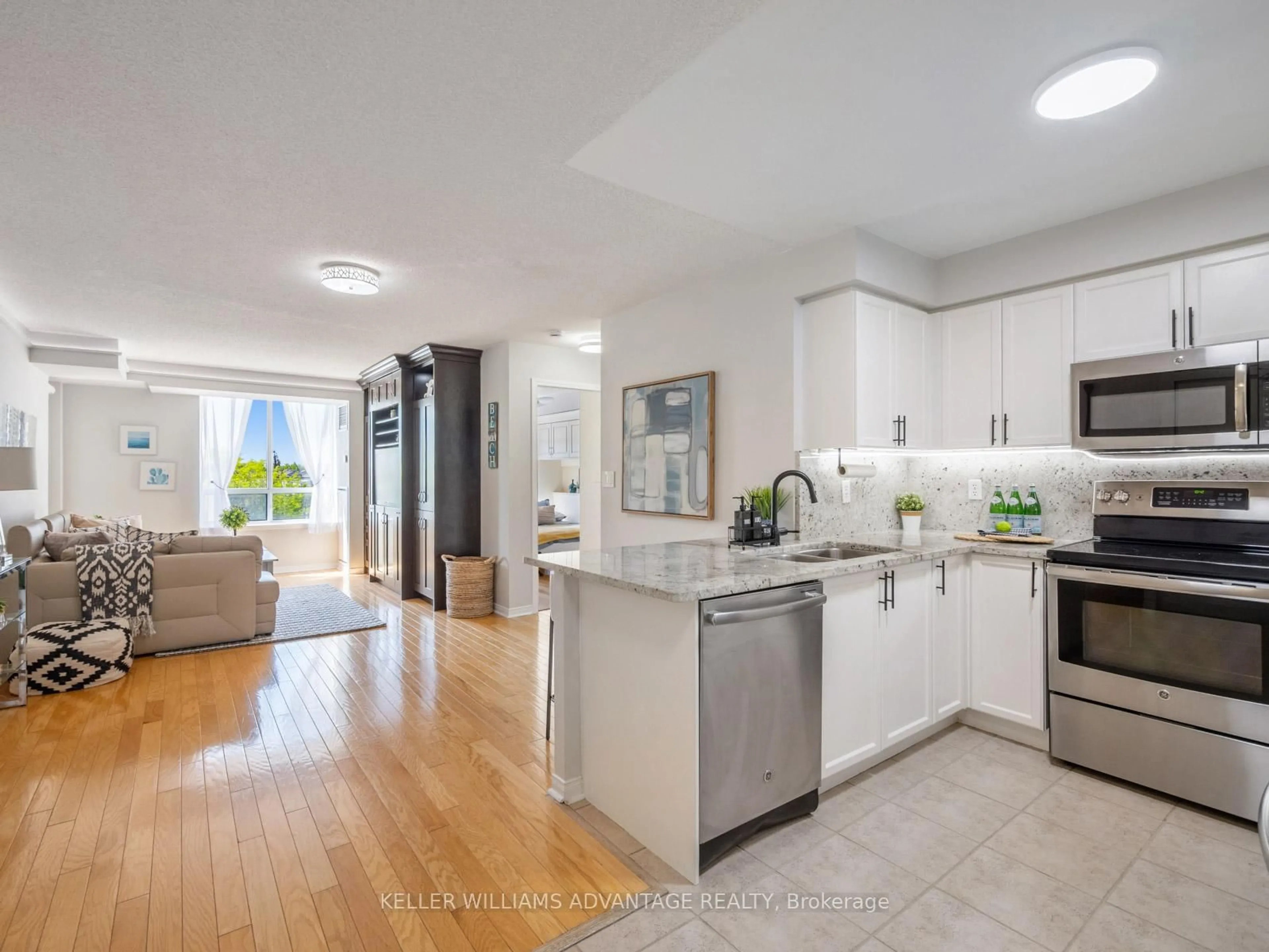 Open concept kitchen, unknown for 1733 Queen St #424, Toronto Ontario M4L 6S9
