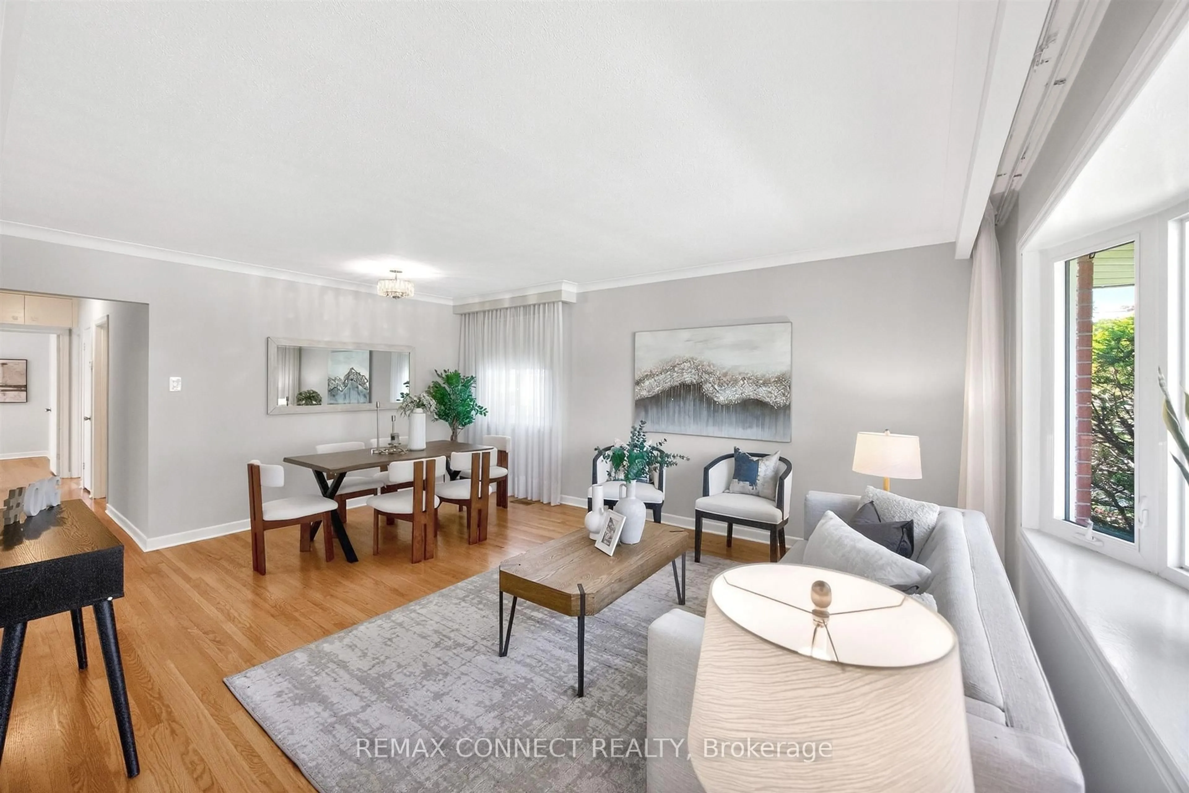 Living room with furniture, wood/laminate floor for 6 Faraday Dr, Toronto Ontario M1H 2S1