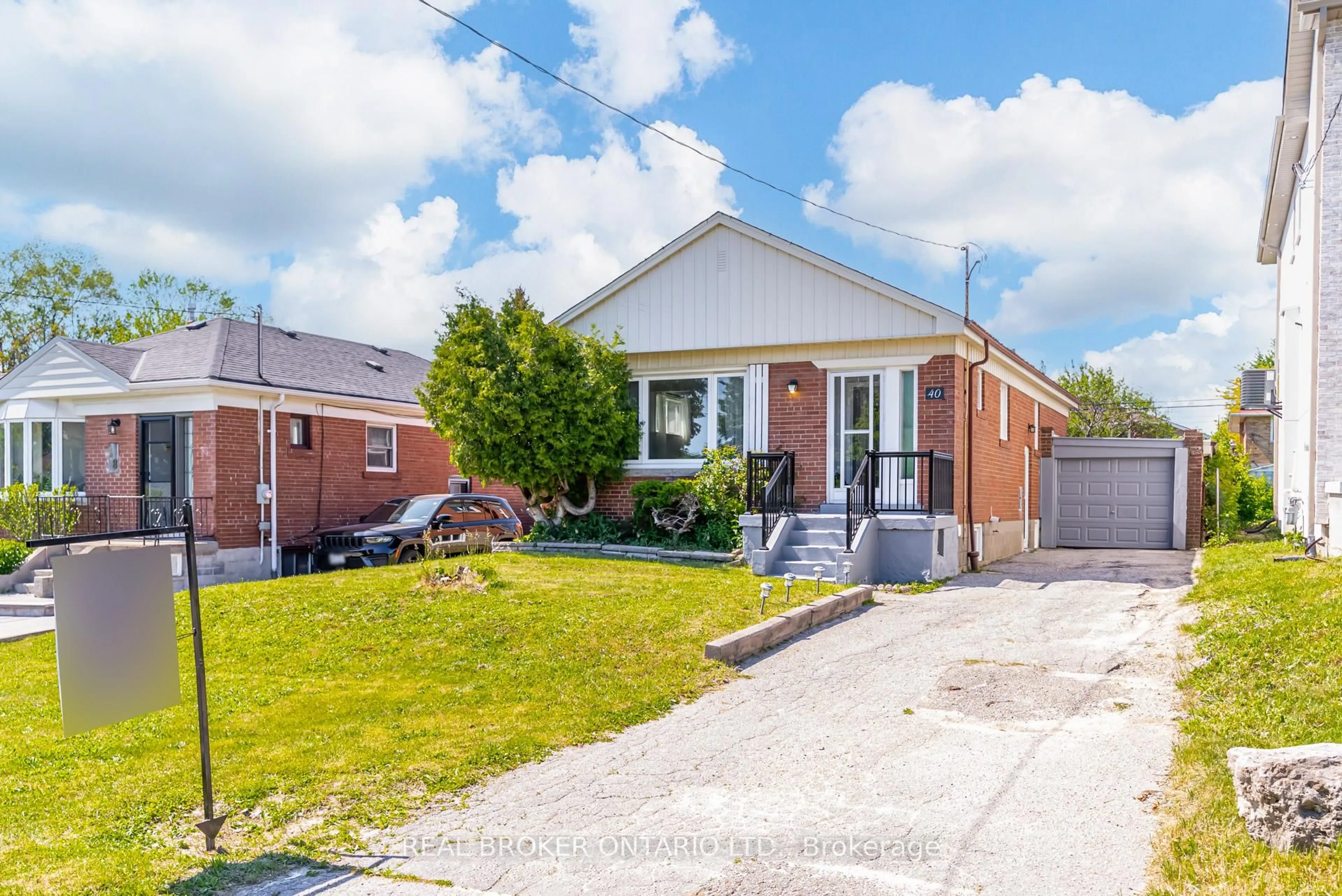 Home with brick exterior material, street for 40 Japonica Rd, Toronto Ontario M1R 4S2