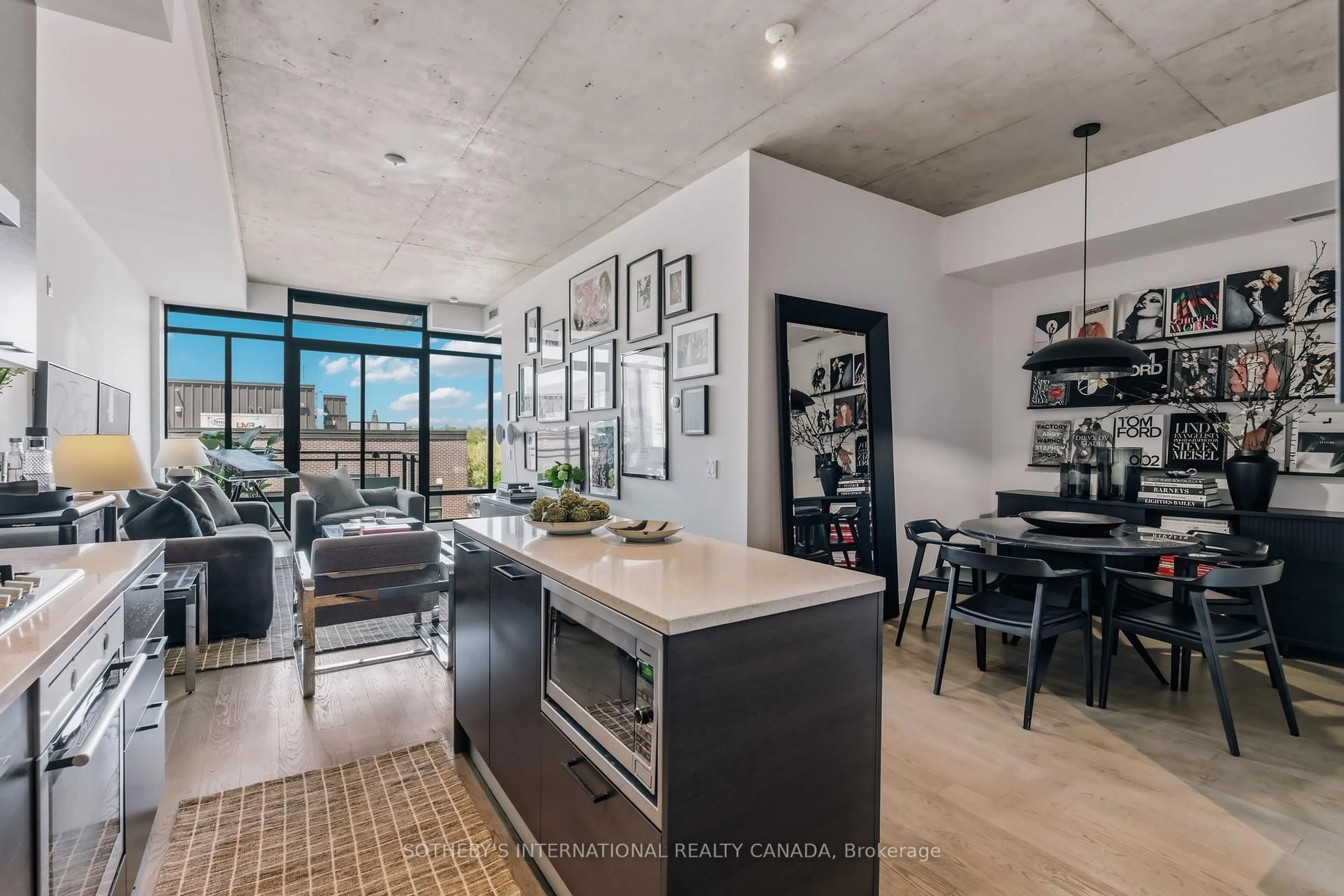 Open concept kitchen, cement floor for 90 Broadview Ave #629, Toronto Ontario M4M 0A7