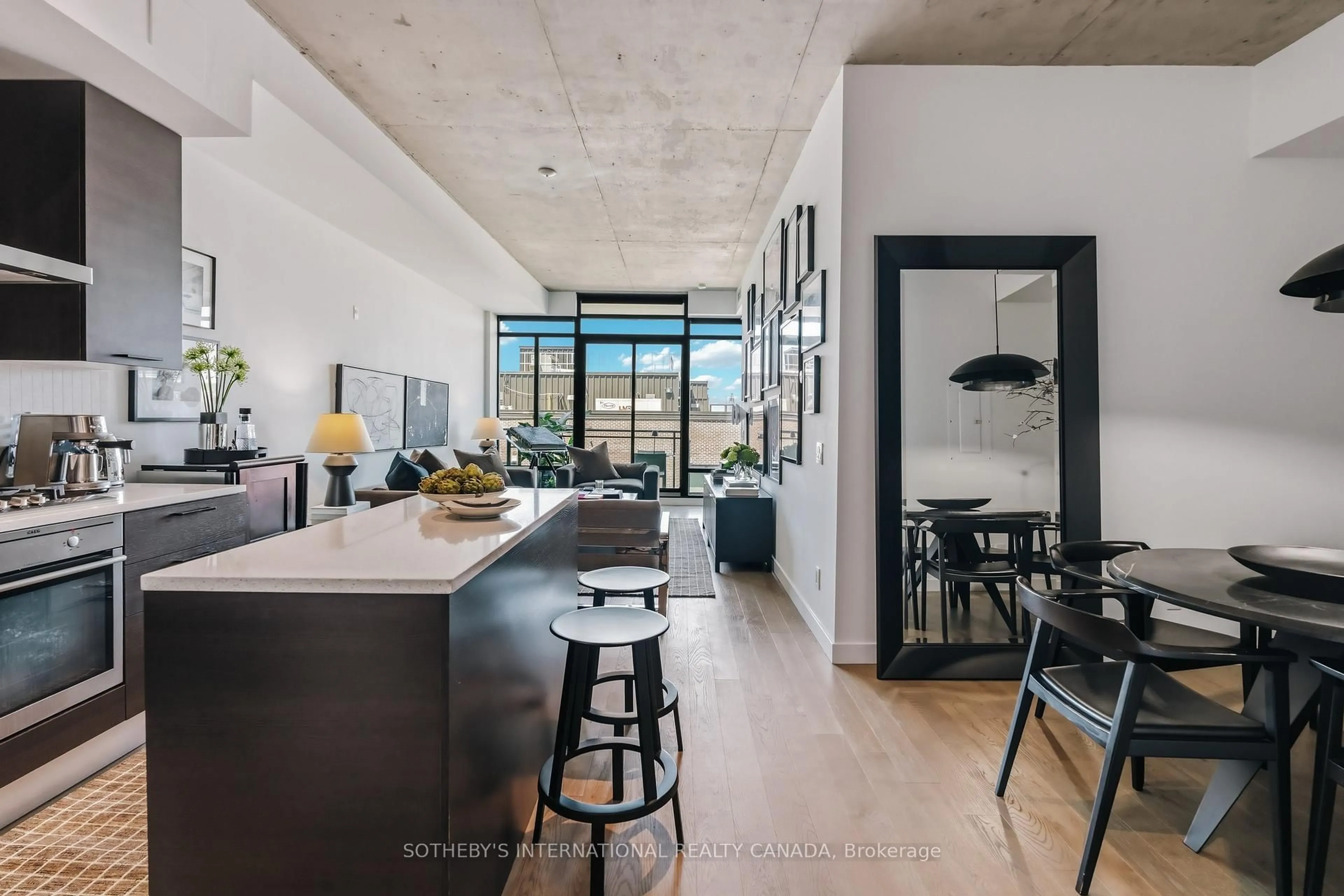 Open concept kitchen, cement floor for 90 Broadview Ave #629, Toronto Ontario M4M 0A7