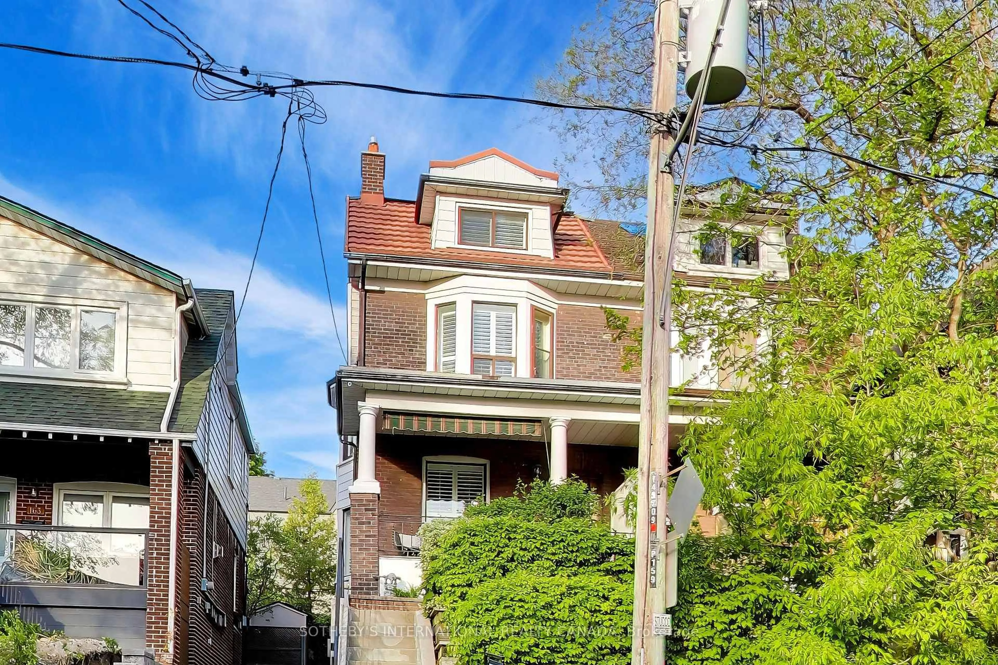 Home with brick exterior material, street for 159 Glenmount Park Rd, Toronto Ontario M4E 2N3