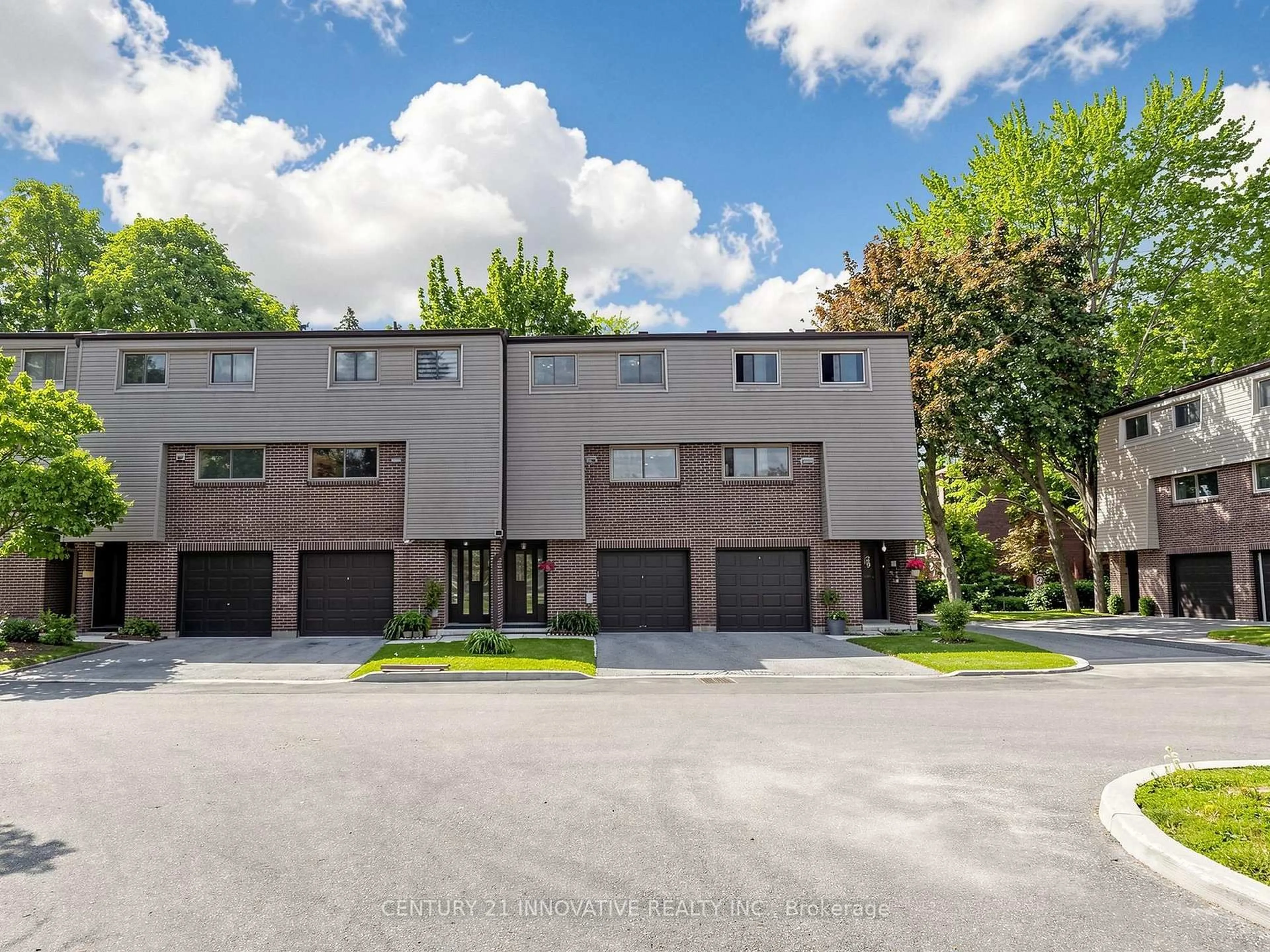 A pic from outside/outdoor area/front of a property/back of a property/a pic from drone, street for 2020 Pharmacy Ave #28, Toronto Ontario M1T 1H8