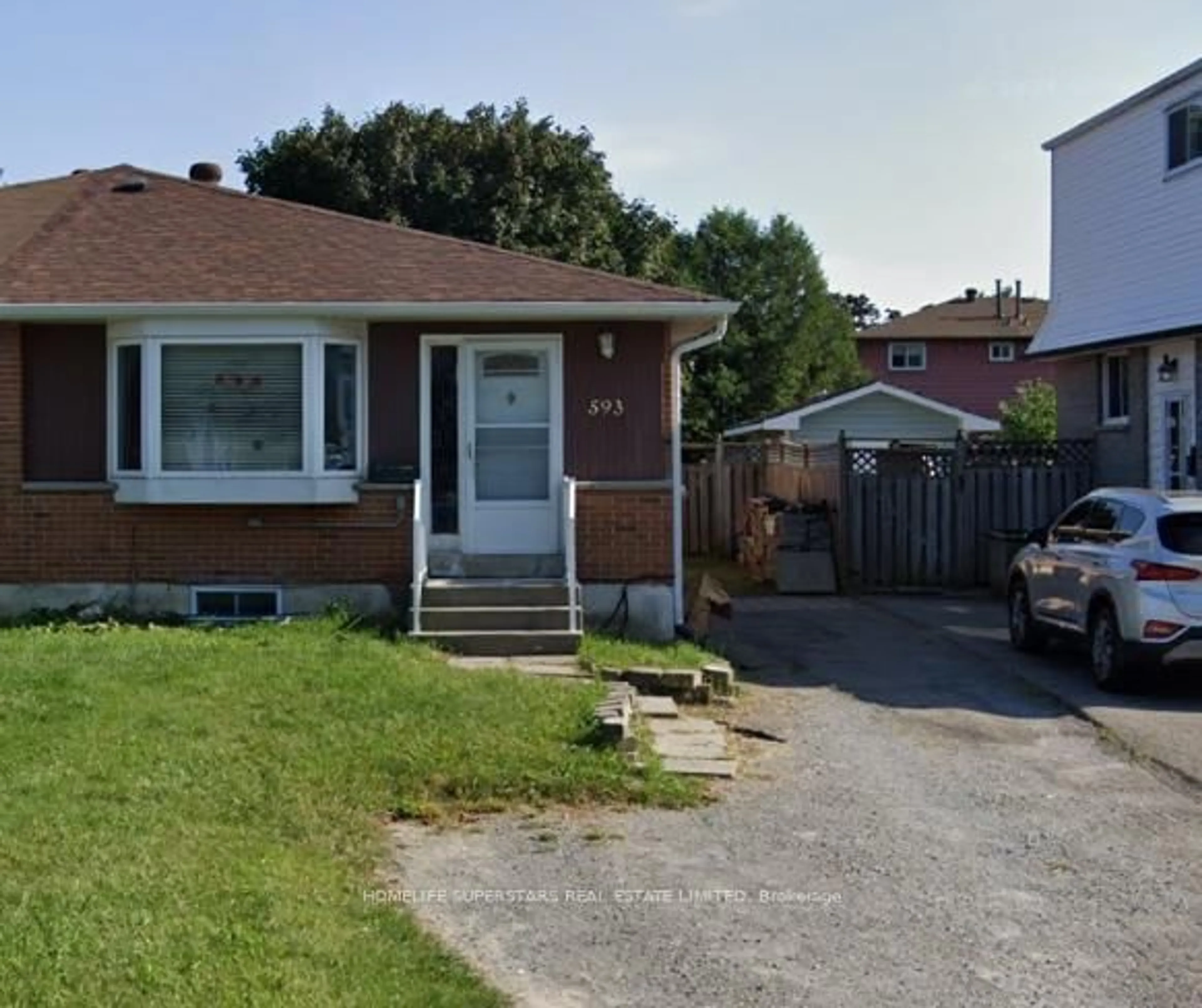 Home with brick exterior material, street for 593 Radisson Ave, Oshawa Ontario L1J 1X7