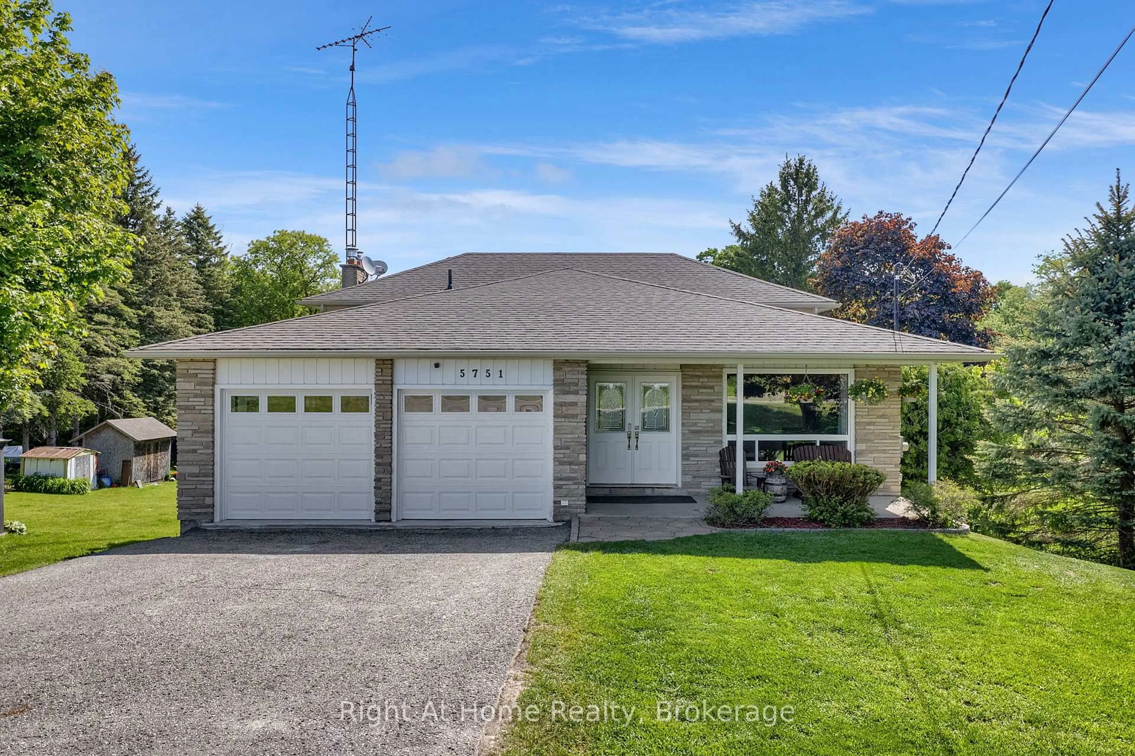 Home with vinyl exterior material, street for 5751 Main St, Clarington Ontario L0B 1M0
