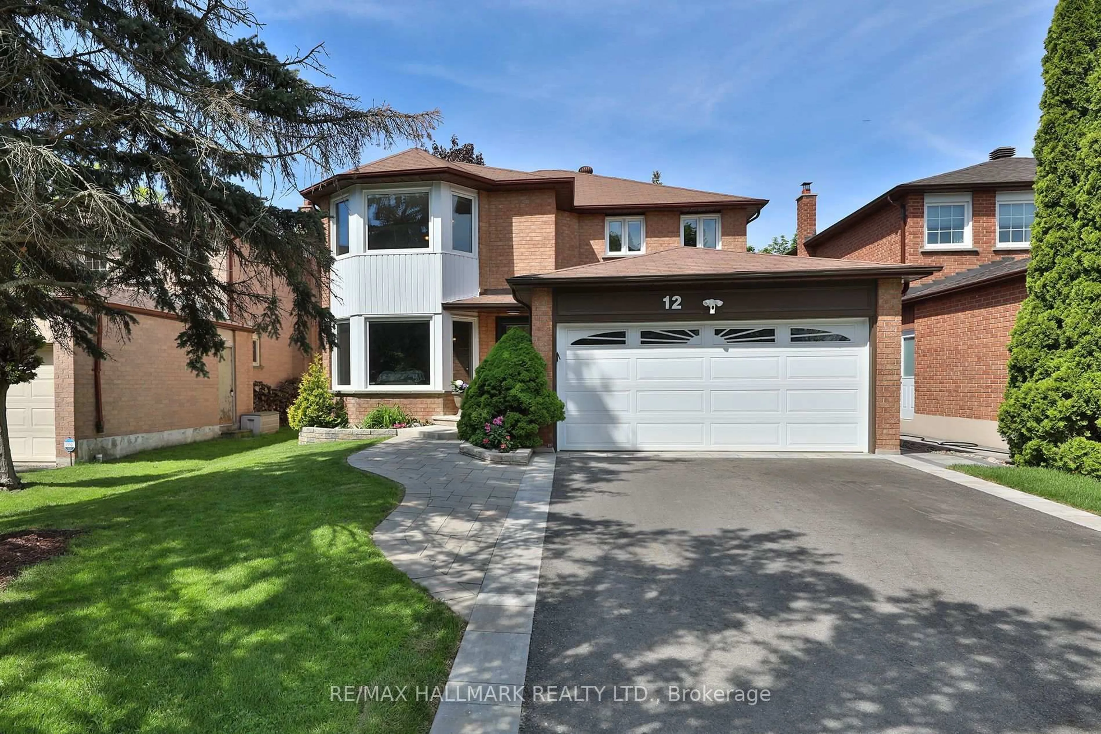 Home with brick exterior material, street for 12 Bowes Garden Crt, Toronto Ontario M1C 4L5