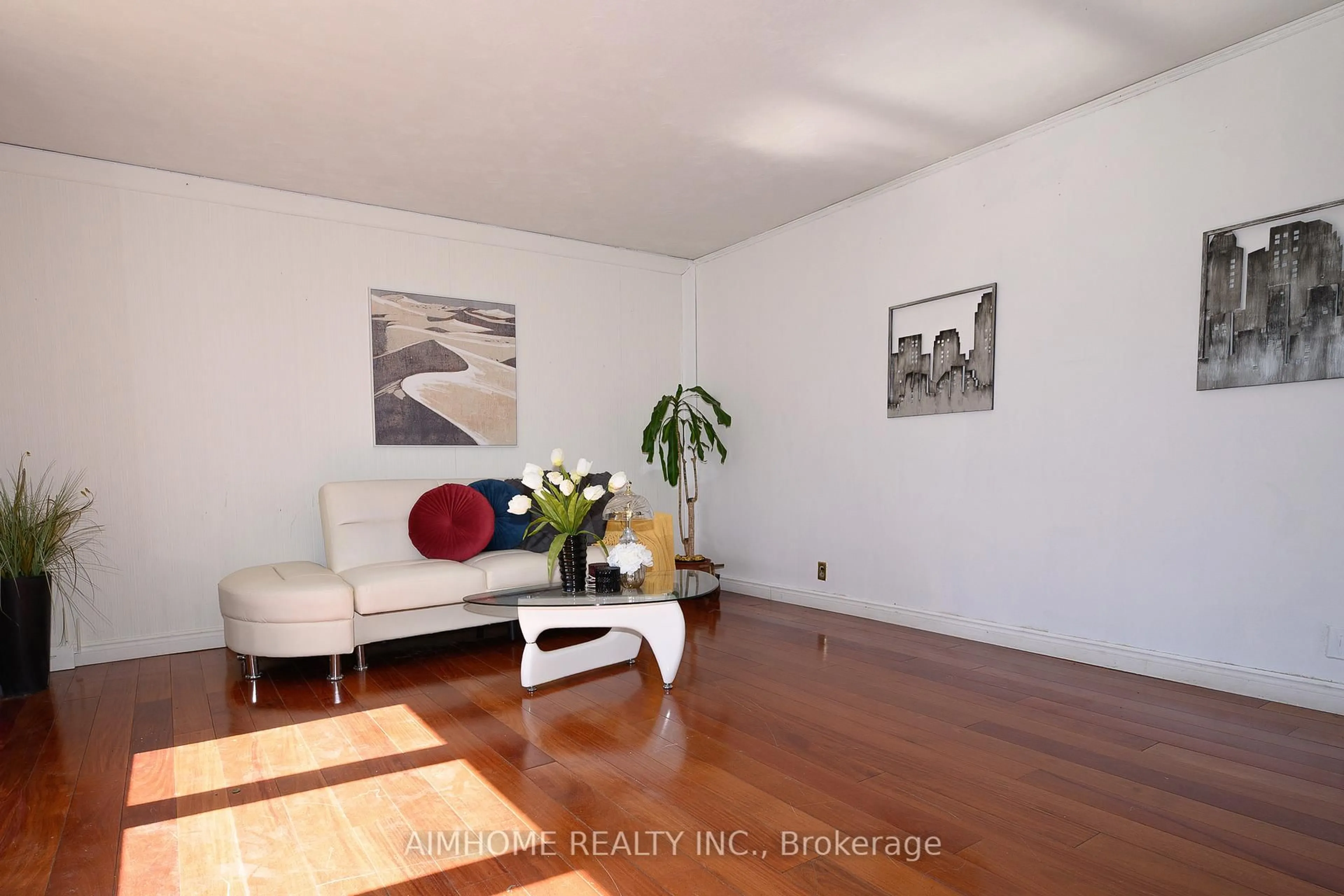 Living room with furniture, wood/laminate floor for 49 Bellefontaine St, Toronto Ontario M1S 1J6