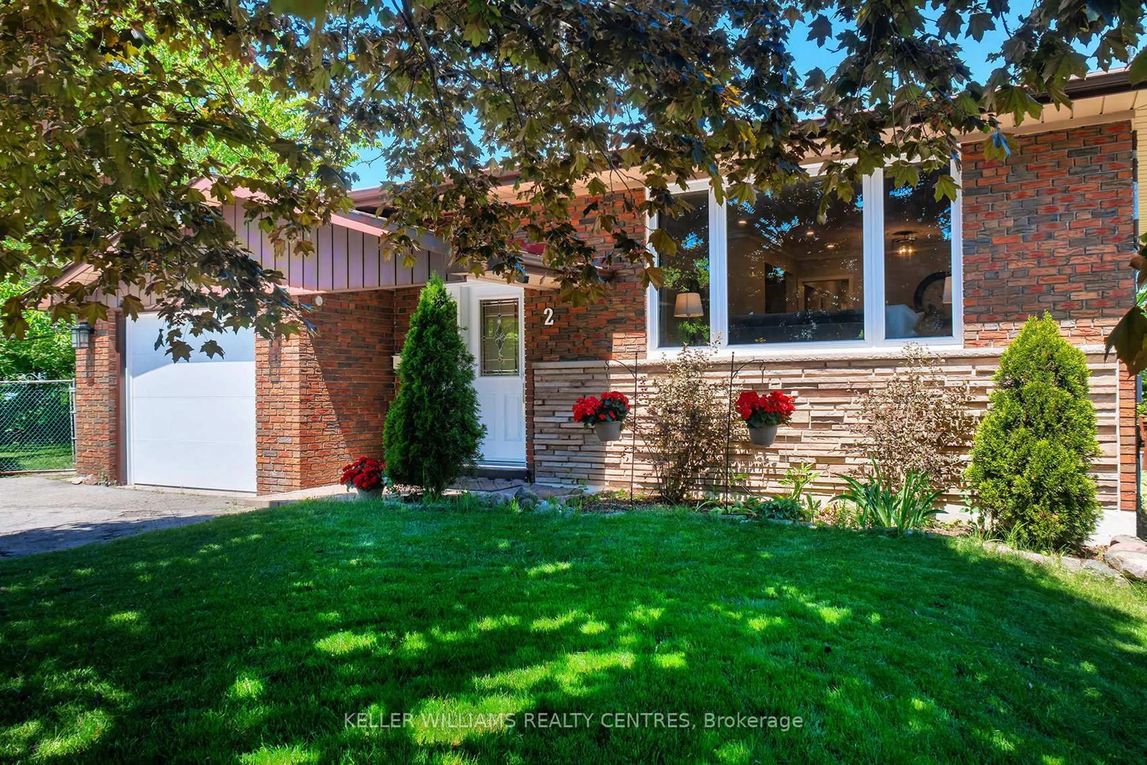 Home with brick exterior material, street for 2 Banmoor Blvd, Toronto Ontario M1J 2Y9