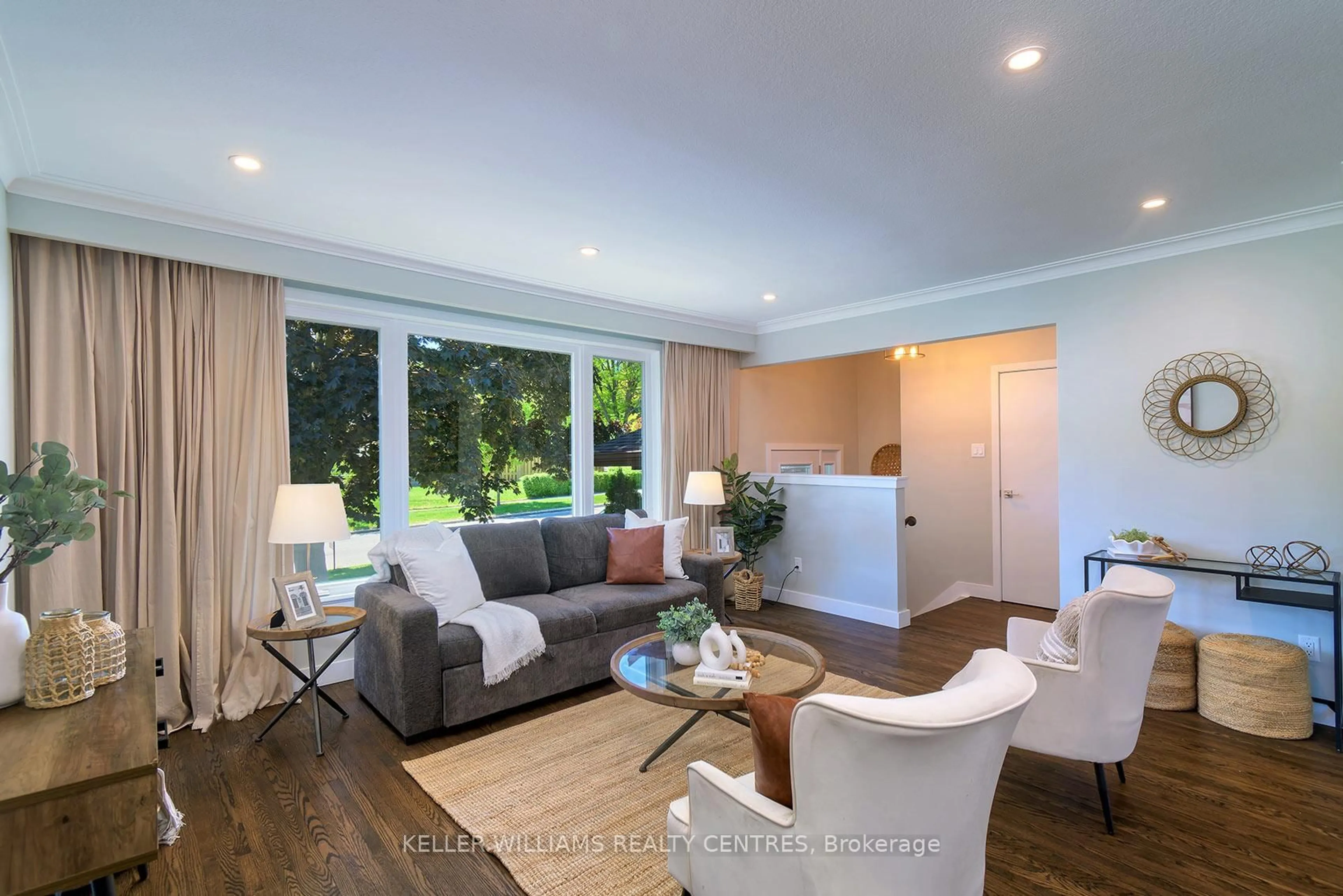 Living room with furniture, wood/laminate floor for 2 Banmoor Blvd, Toronto Ontario M1J 2Y9