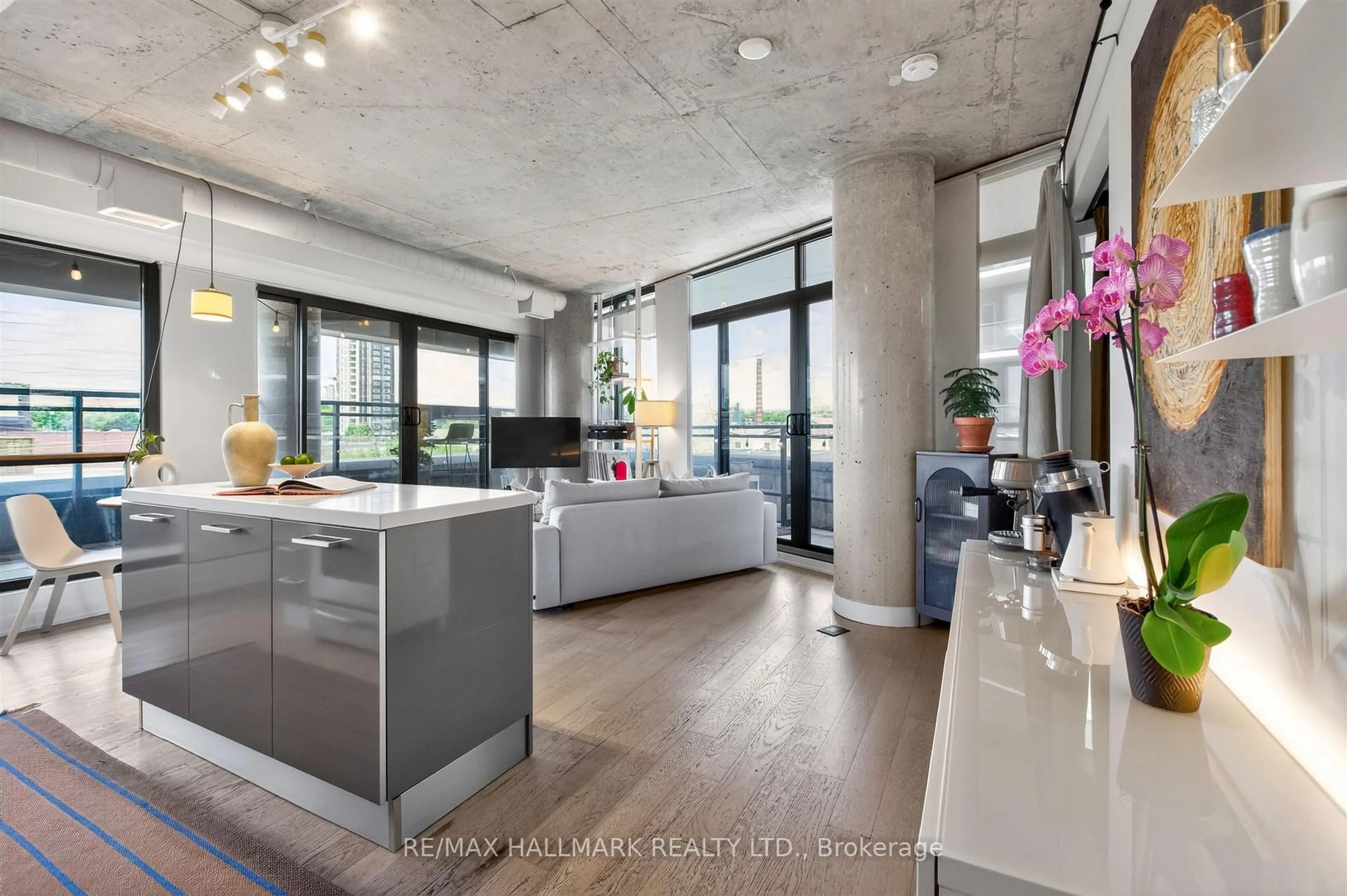 Open concept kitchen, cement floor for 319 Carlaw Ave #508, Toronto Ontario M4M 0A4