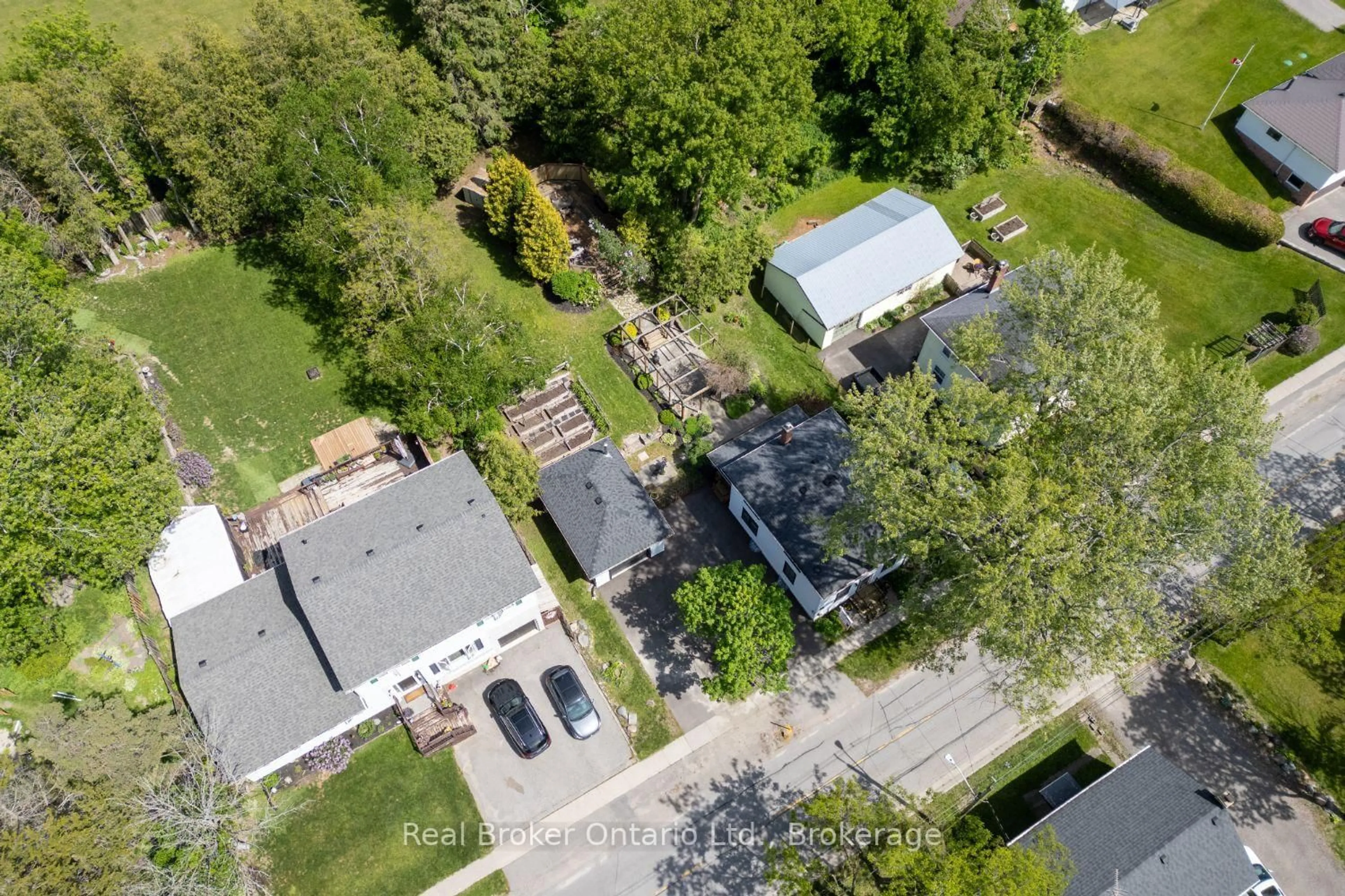 A pic from outside/outdoor area/front of a property/back of a property/a pic from drone, street for 61 Mill St, Clarington Ontario L0B 1M0