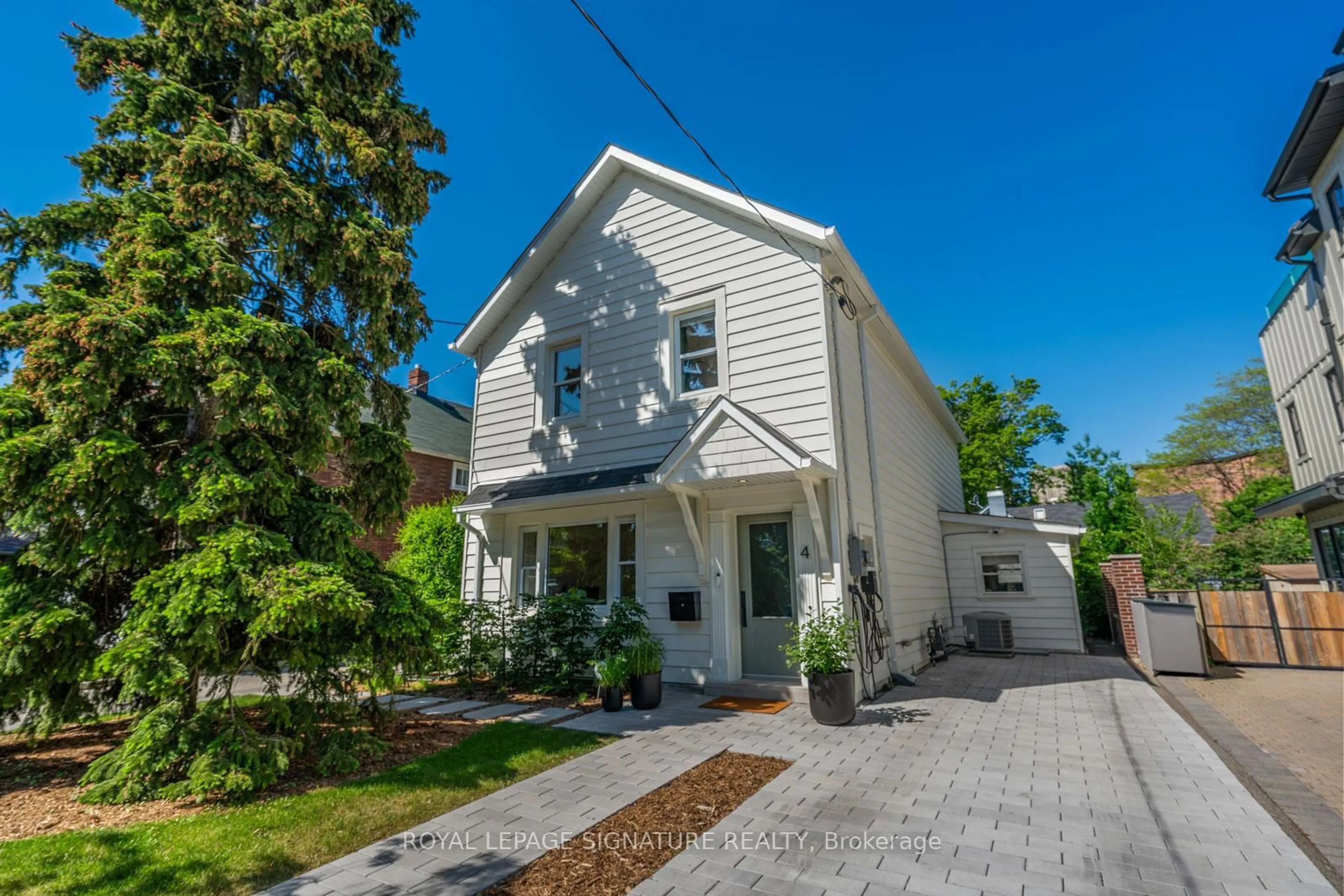 Home with vinyl exterior material, street for 4 Kimberley Ave, Toronto Ontario M4E 2Z2